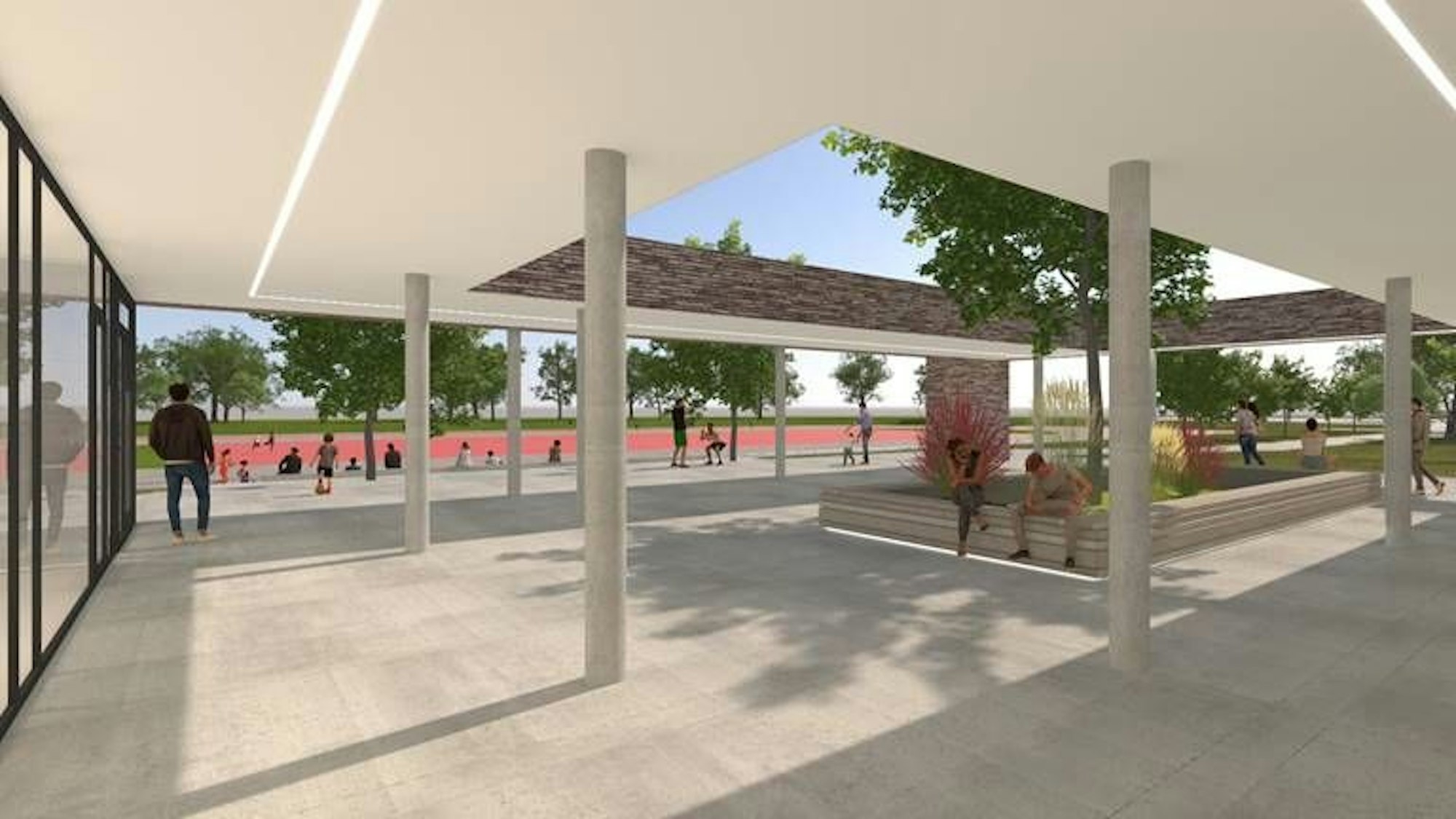 Eine Ansicht des Atriums vor dem Foyer der neuen Doppelsporthalle mit Blick auf den Fußballplatz.