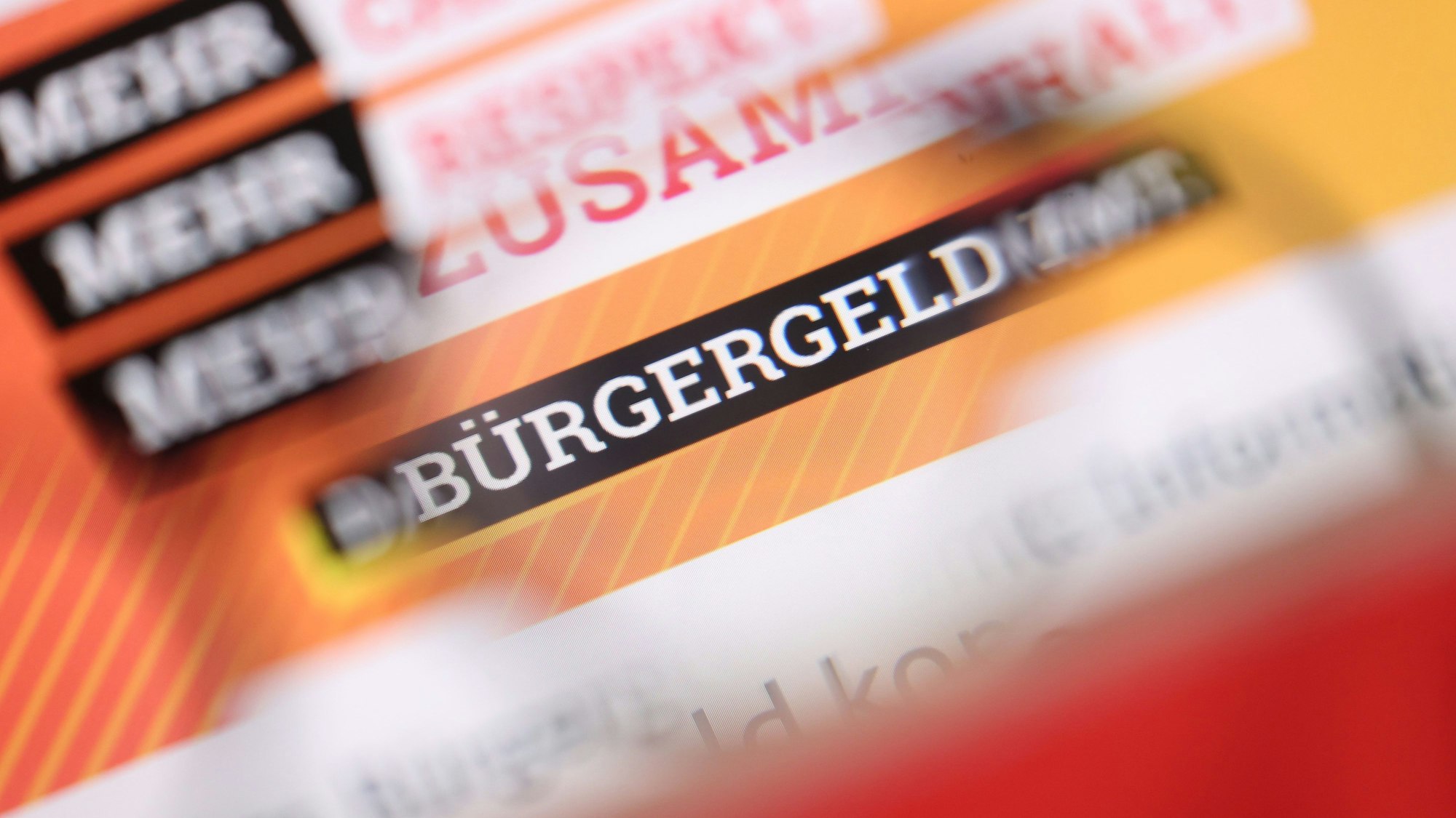 «Bürgergeld» ist auf der Homepage des Bundesministeriums für Arbeit und Soziales durch eine Brille zu lesen.