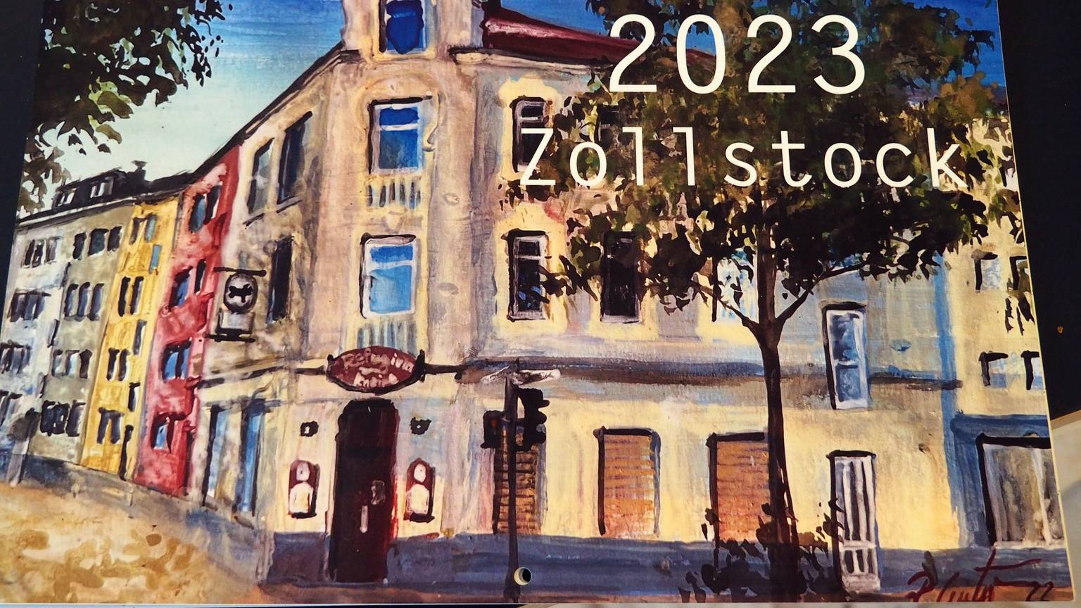 Auf dem Aquarell von Renate Geiter ist die Kneipe Refugium zu sehen und die Häuser links und rechts. Es ist das Deckblatt des Zollstock-Kalenders 2023.