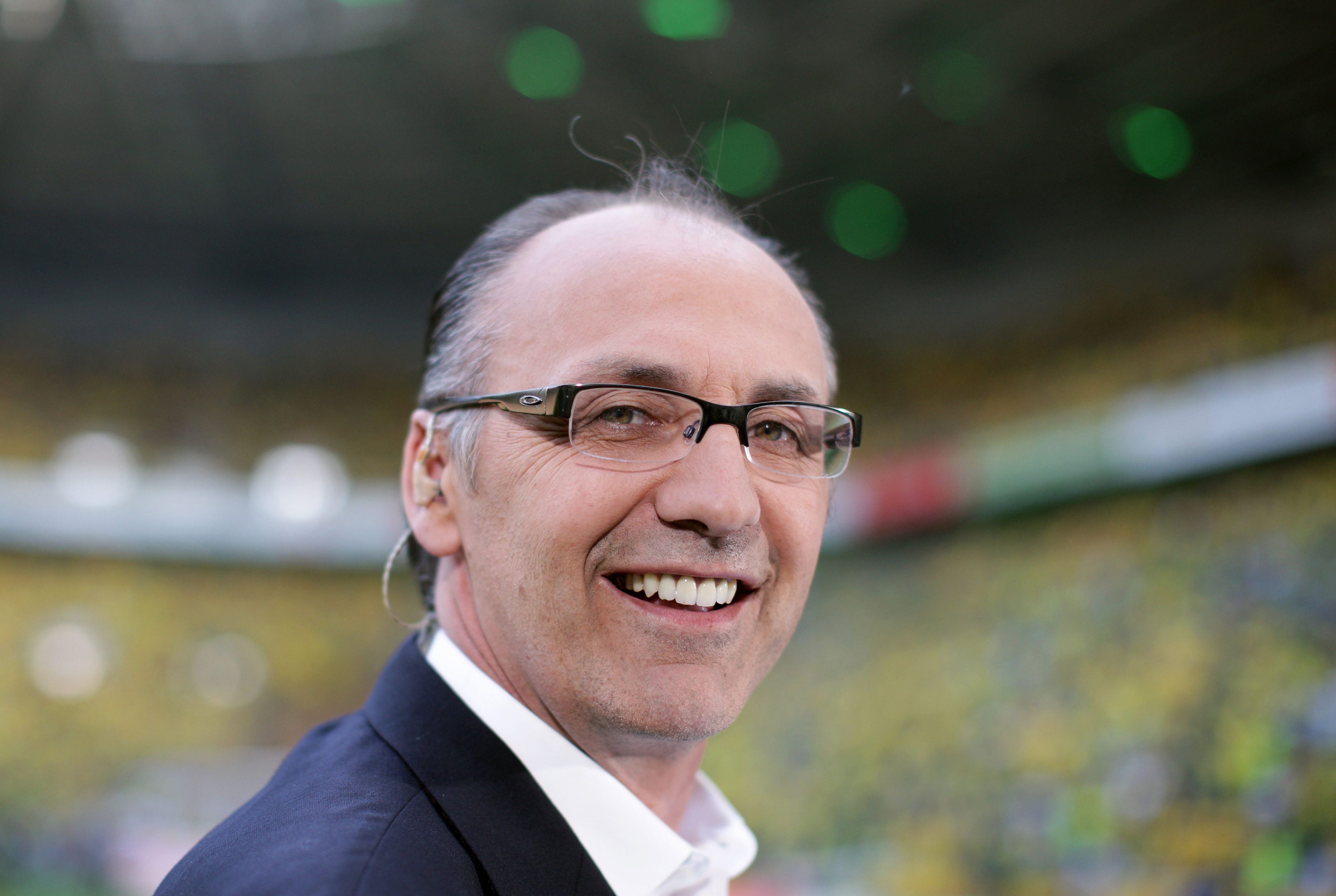 Jürgen Kohler lächelt in die Kamera.