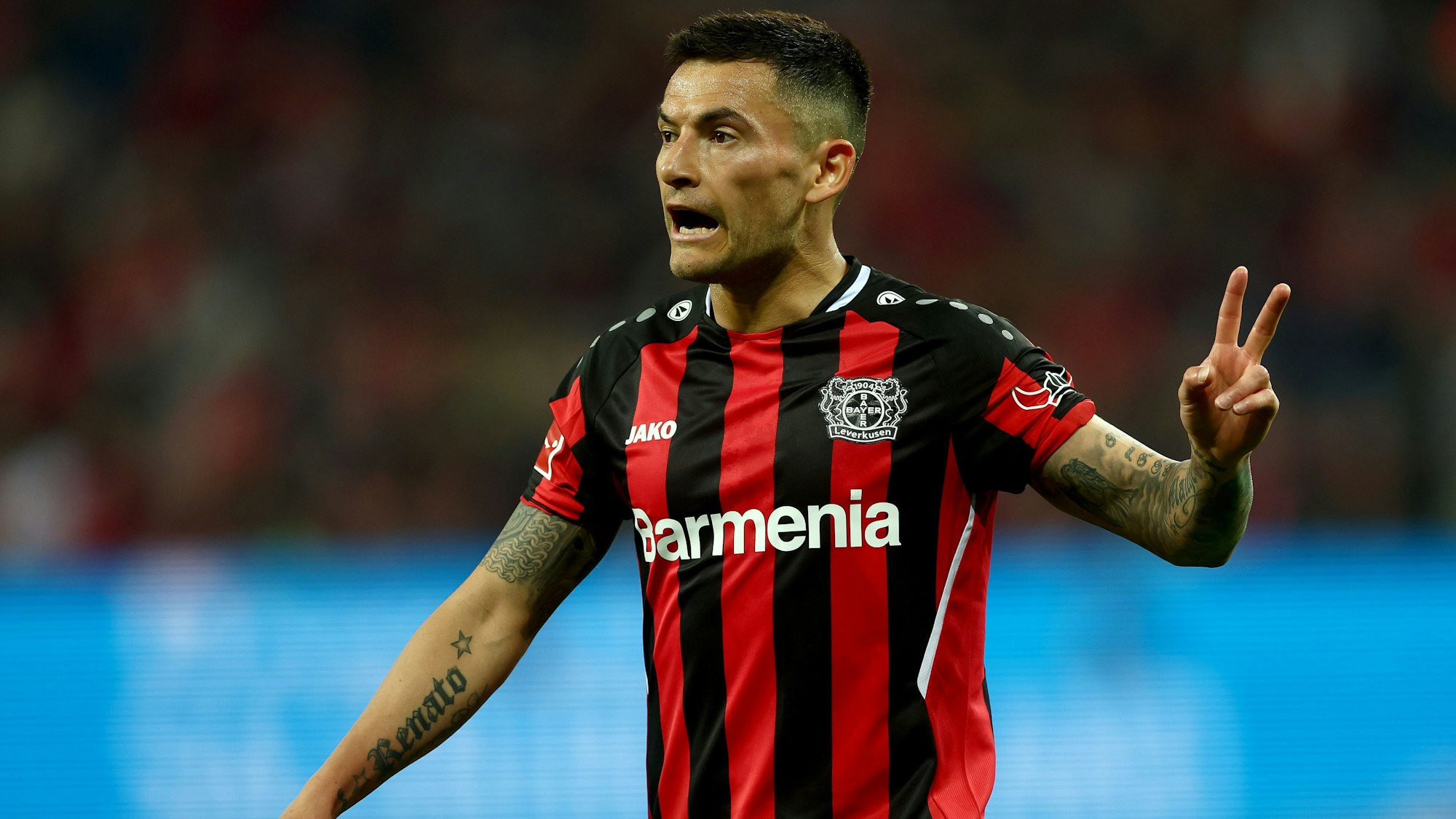 LEVERKUSEN, GERMANY - MAY 02: Charles Aranguiz of Leverkusen gestures during the Bundesliga match between Bayer 04 Leverkusen and Eintracht Frankfurt at BayArena on May 02, 2022 in Leverkusen, Germany. (Photo by Lars Baron/Getty Images)