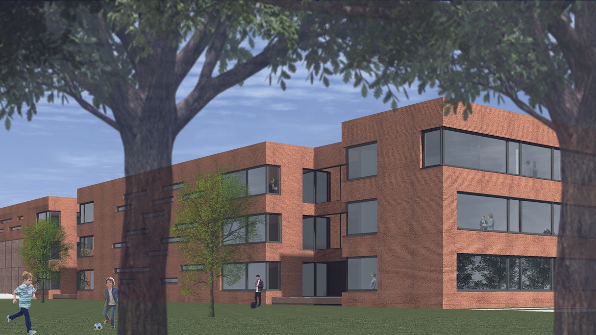 Eine Visualisierung des Schulzentrums mit seiner Erweiterung: mehrere, rot geklinkerte Bauten mit großen Fenstern.