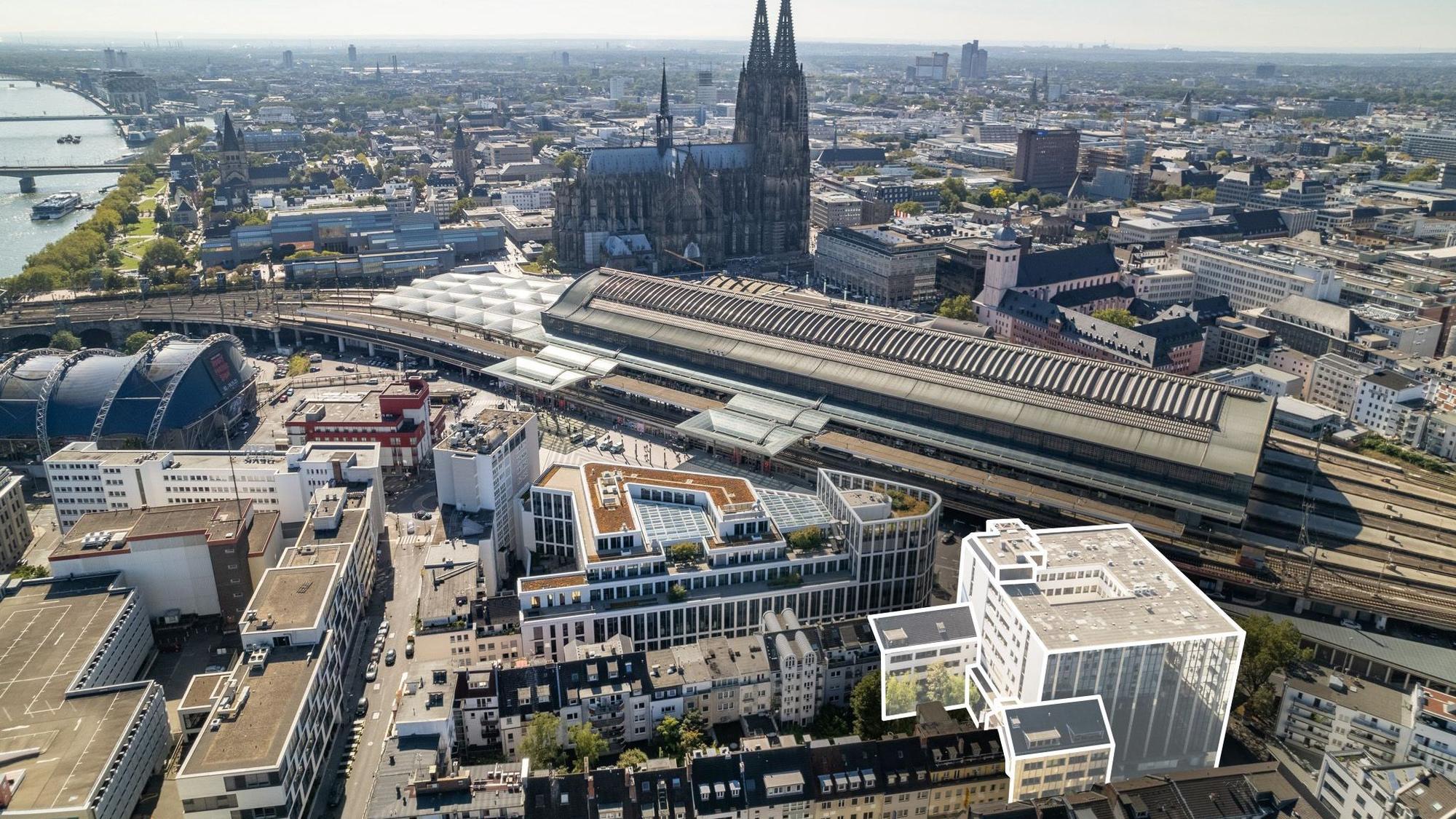 Das Bild zeigt unten rechts das Gebäude, um das es geht.