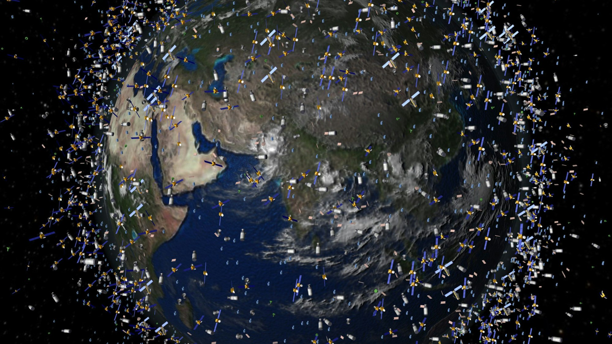 Das computergenerierte Bild der European Space Agency (ESA) zeigt Weltraummüll früherer Weltraummissionen, der neben intakten Satelliten um die Erde kreist (Foto undatiert).
