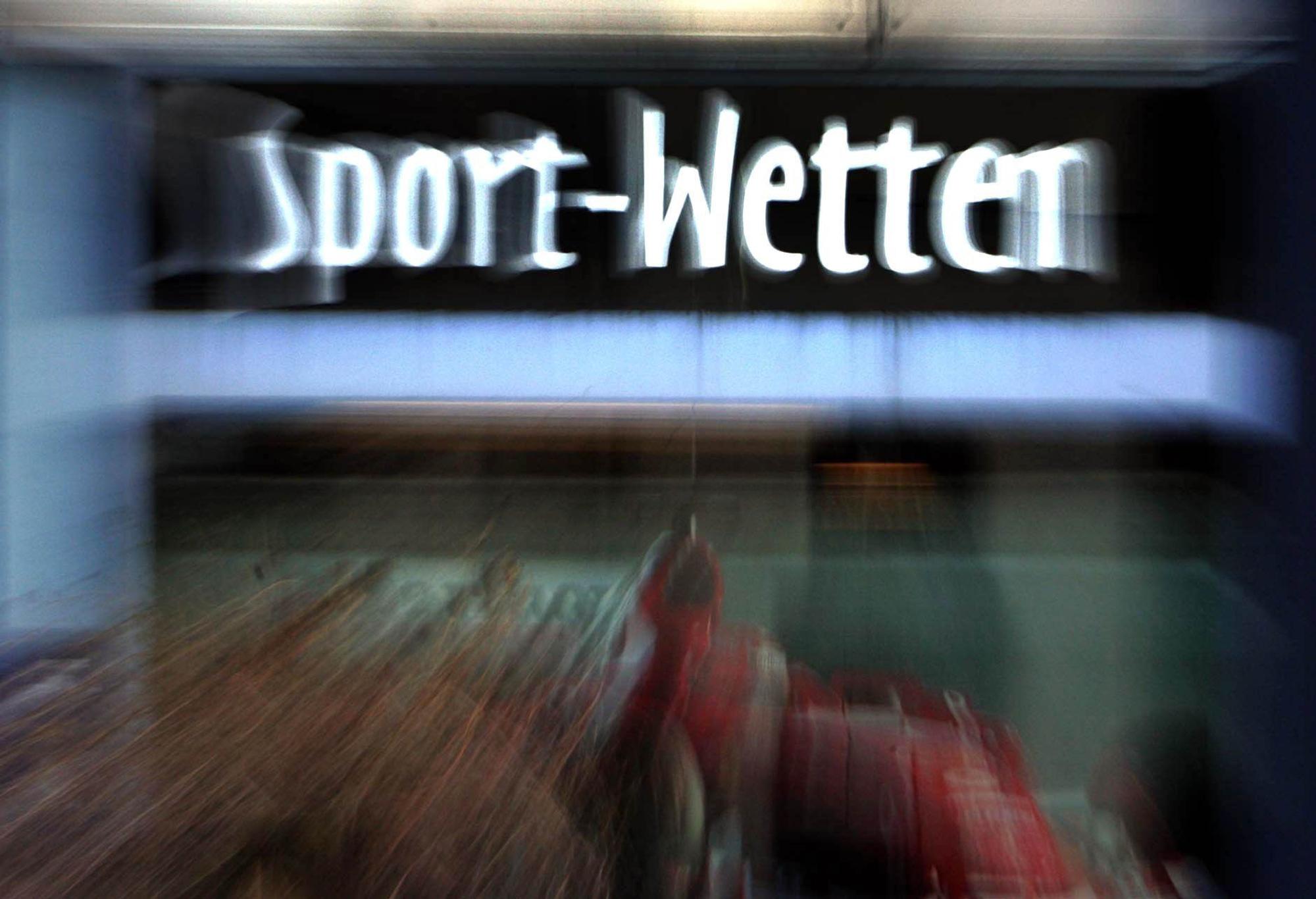Ein Schild mit der Aufschrift „Sport-Wetten“.
