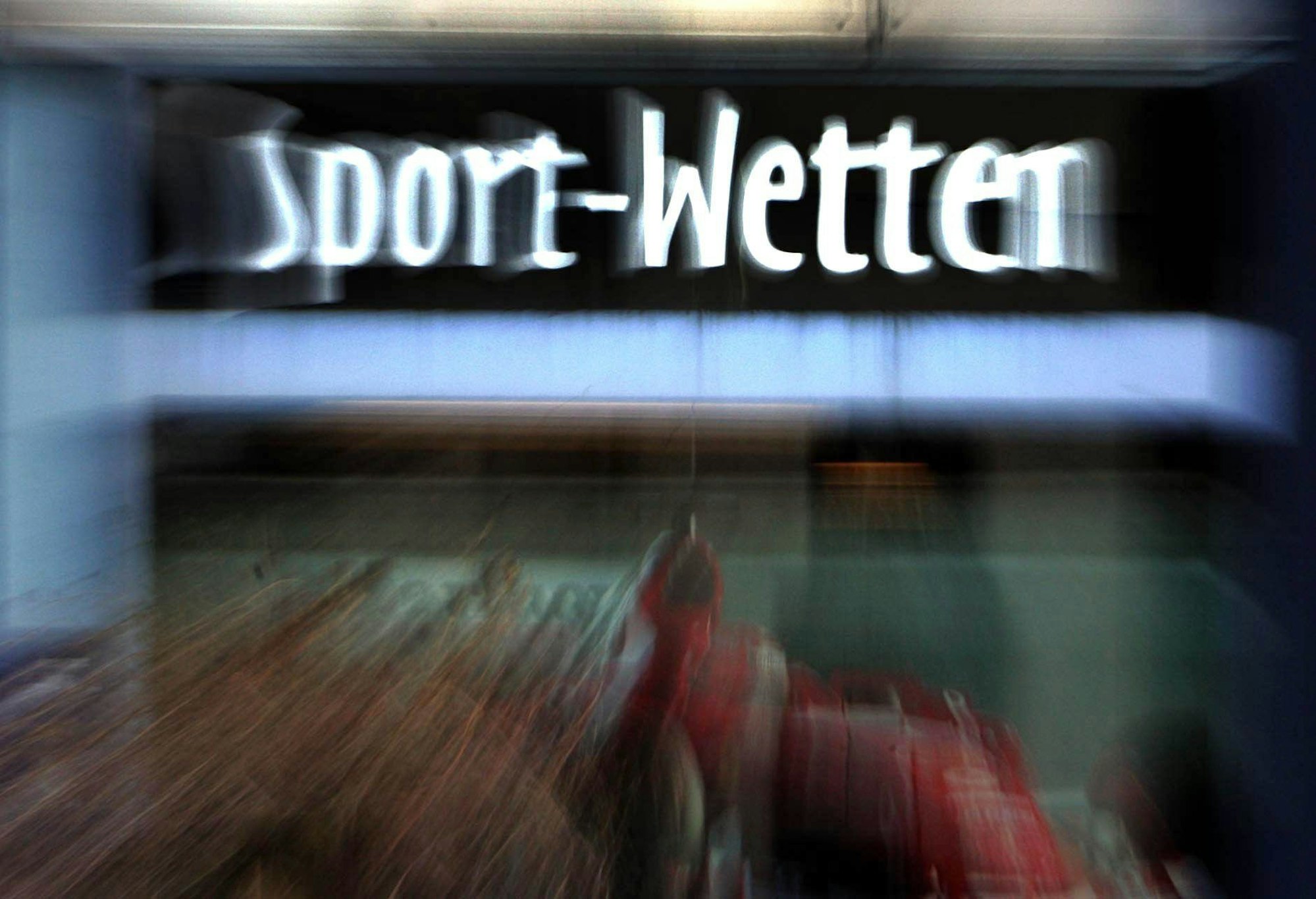 Ein Schild mit der Aufschrift „Sport-Wetten“.