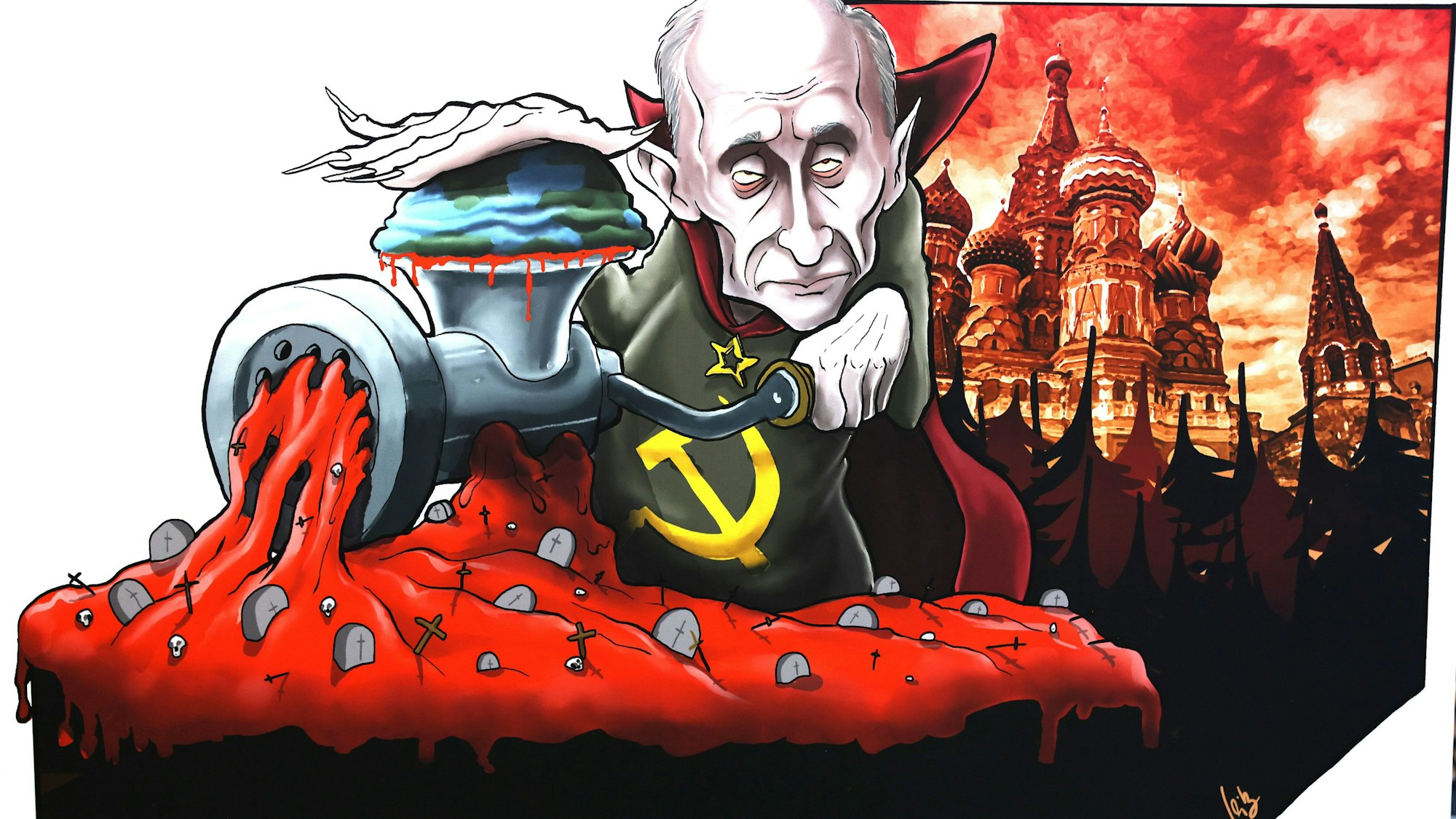 Die Weltlage beschäftigt die Karnevalisten: Wladimir Putin dreht auf einem Kölner Persiflagewagen die Welt durch den Fleischwolf.