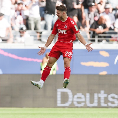 FRANKFURT AM MAIN, GERMANY - AUGUST 21: Jan Thielmann of 1. FC Köln celebrates their team's first goal during the Bundesliga match between Eintracht Frankfurt and 1. FC Köln at Deutsche Bank Park on August 21, 2022 in Frankfurt am Main, Germany. (Photo by Alex Grimm/Getty Images)