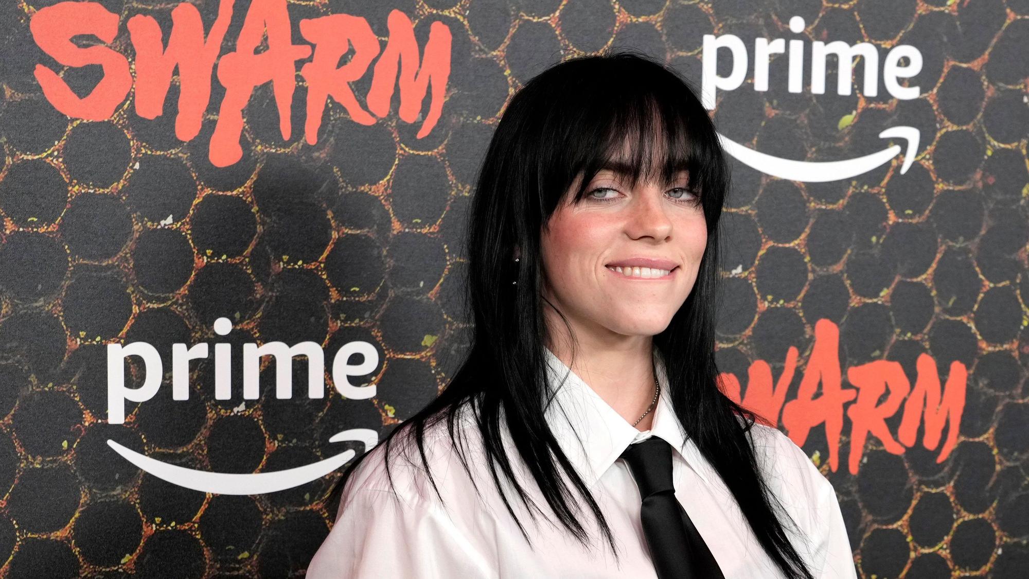 Singer Billie Eilish poses at the premiere of the Amazon Prime Video series "Swarm," Tuesday, March 14, 2023, at Lighthouse ArtSpace in Los Angeles. (AP Photo/Chris Pizzello)