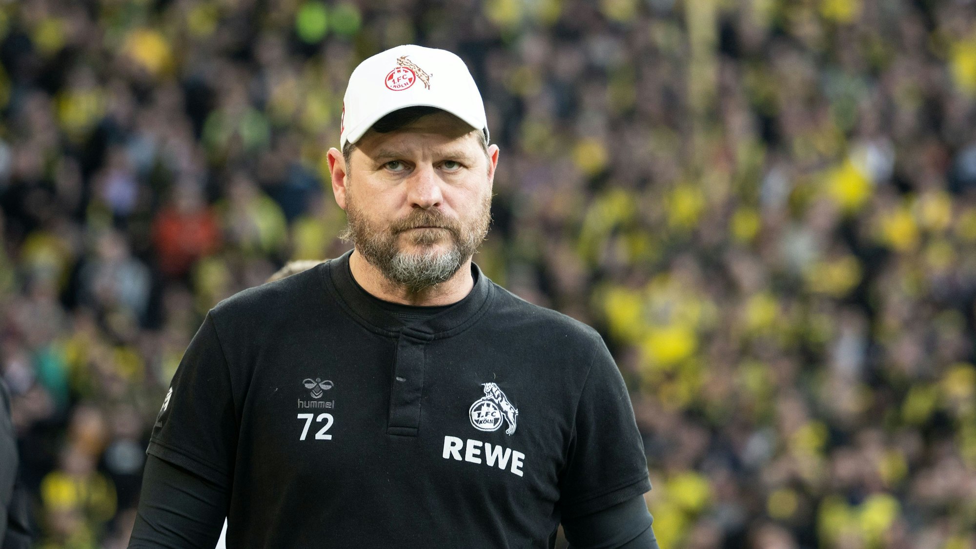 Steffen Baumgart mit 1. FC Köln-Kappe.