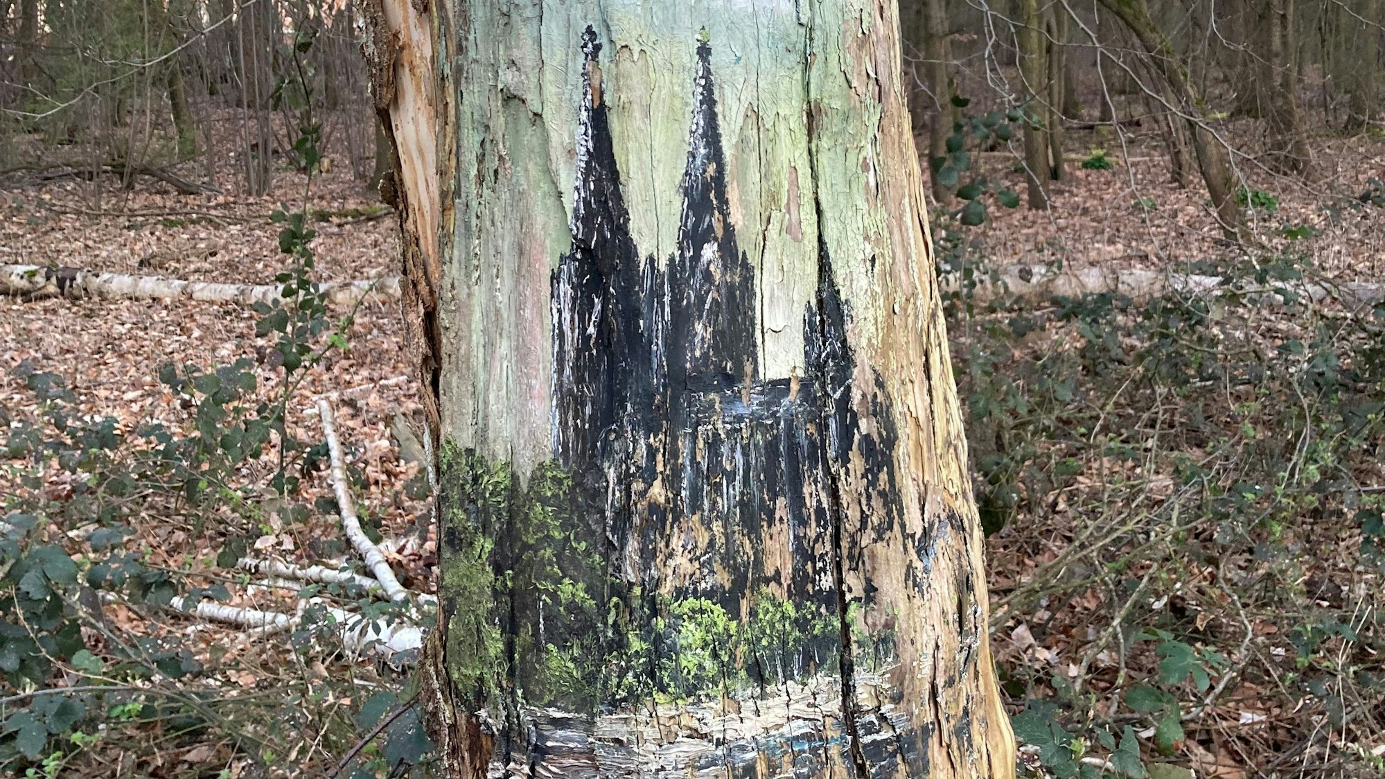 Gemälde des Waldmalers mit dem Kölner Dom im Wald in Longerich.