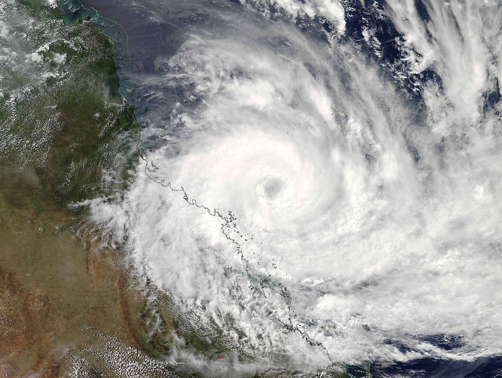 Ein Satellitenbild der NASA zeigt den Wirbelsturm Debbie am 27.03.2017 über der Küste des australischen Bundesstaates Queenland. Mit Windgeschwindigkeiten von bis zu 260 Stundenkilometern hatte der Wirbelsturm Debbie die australische Nordostküste erreicht.