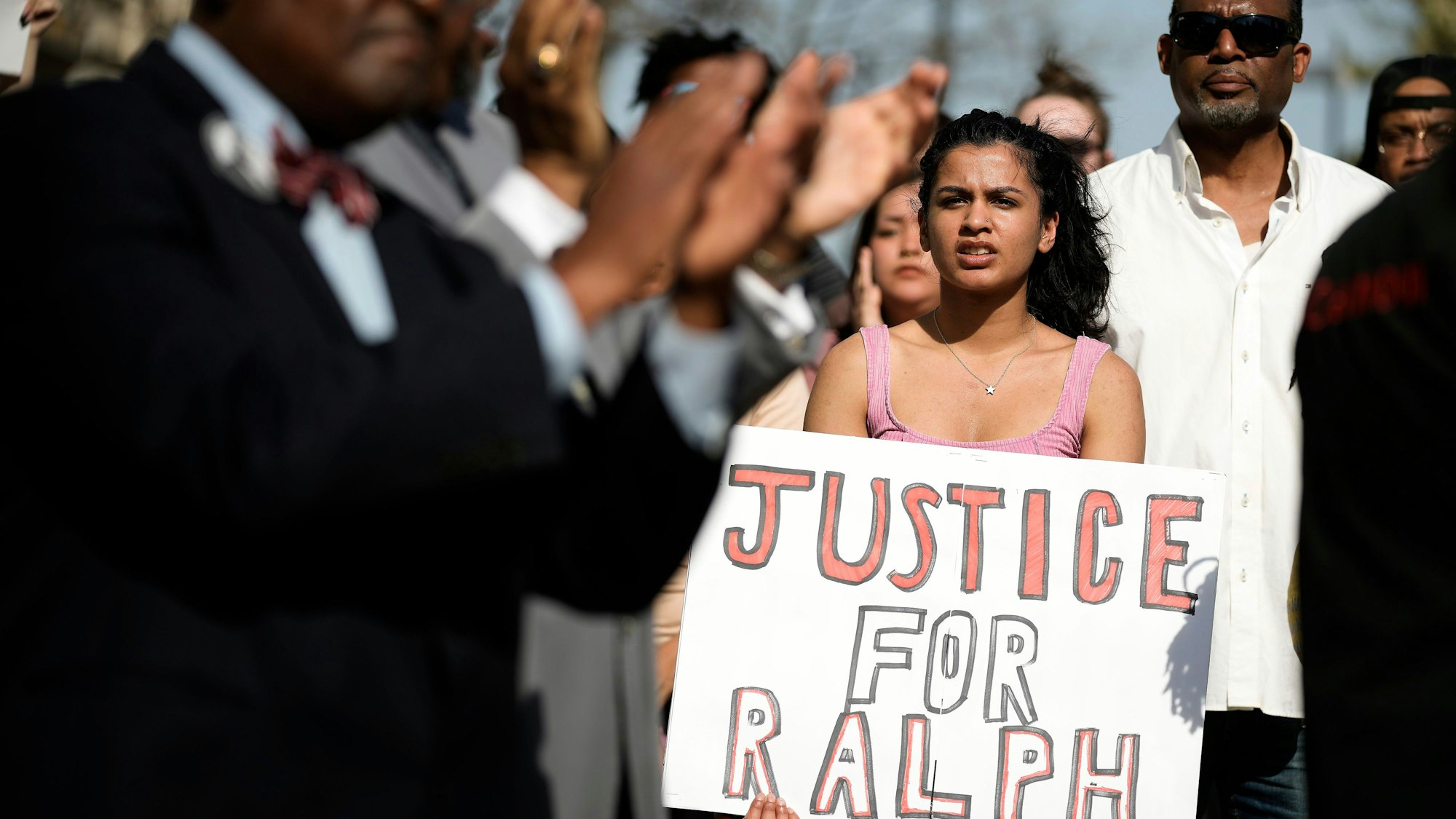 People attend a rally to support Ralph Yarl, Tuesday, April 18, 2023, in Kansas City, Mo. Yarl, a Black teenager, was shot last week by a white homeowner when he mistakenly went to the wrong address to pick up his younger brothers. (AP Photo/Charlie Riedel)