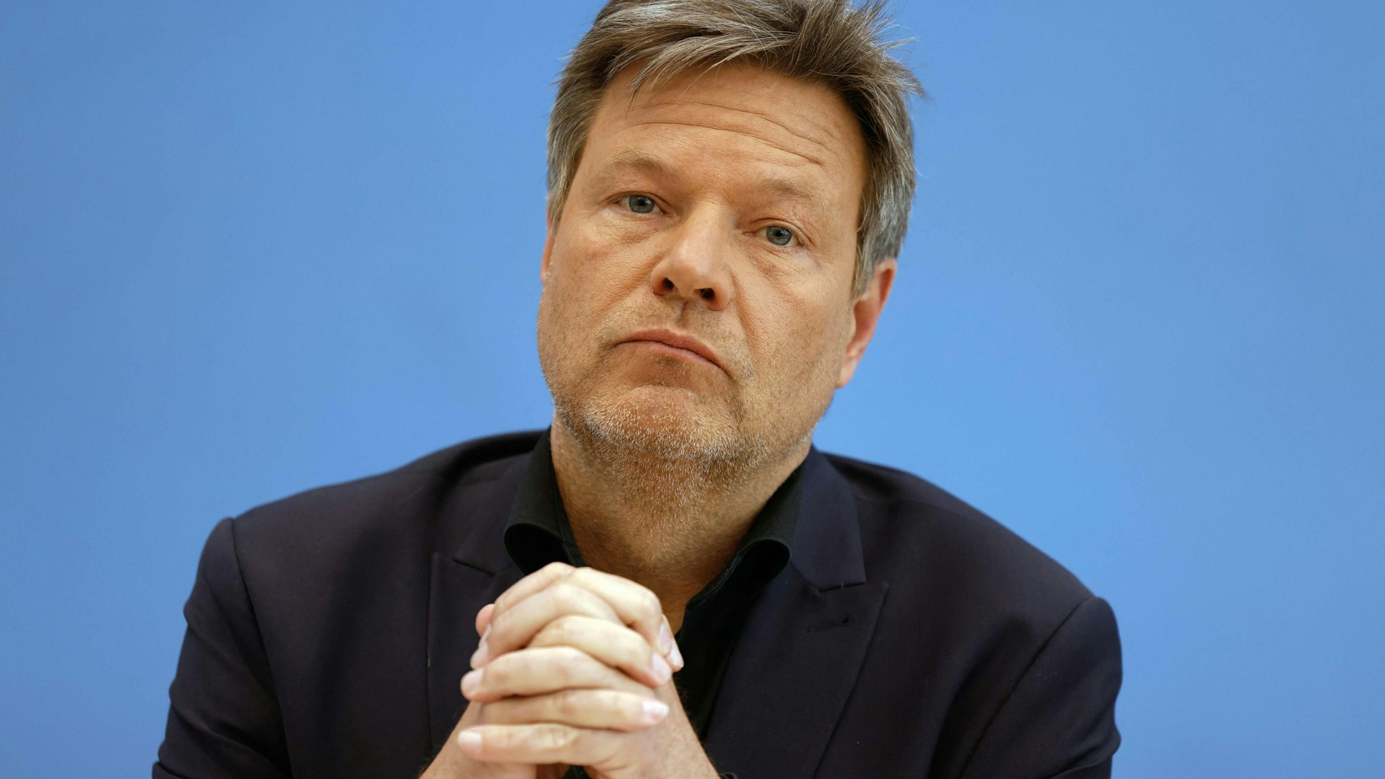 German Minister of Economics and Climate Protection Robert Habeck looks on during a press conference on the government's growth forecast, in Berlin on April 26, 2023. - The German government lifted its growth forecast for this year as rebounding industrial production and slowing inflation helped Europe's top economy weather an energy crisis. (Photo by Odd ANDERSEN / AFP)