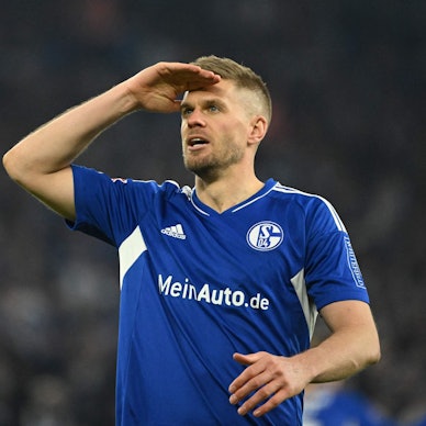 Schalke's German forward Simon Terodde celebrates scoring the 3-1 goal during the German first division Bundesliga football match between FC Schalke 04 and Hertha Berlin in Gelsenkirchen, western Germany, on April 14, 2023. (Photo by INA FASSBENDER / AFP) / DFL REGULATIONS PROHIBIT ANY USE OF PHOTOGRAPHS AS IMAGE SEQUENCES AND/OR QUASI-VIDEO