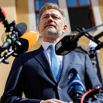 German Finance Minister Christian Lindner gives a press statement prior to a meeting of the "Weimar Triangle" format, an alliance between Poland, France and Germany, with his counterparts from Poland and France, in Ettersburg near Weimar, eastern Germany, on June 27, 2023. (Photo by JENS SCHLUETER / AFP)
