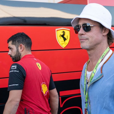 US actor Brad Pitt tours the paddock before the Formula One United States Grand Prix practice session at the Circuit of the Americas in Austin, Texas, on October 21, 2022. (Photo by SUZANNE CORDEIRO / AFP)