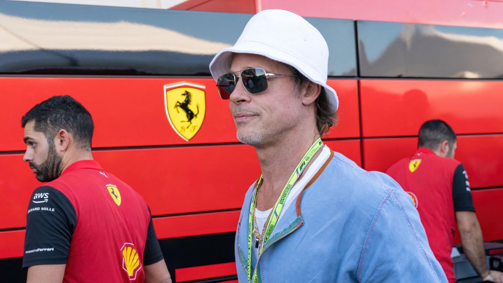 US actor Brad Pitt tours the paddock before the Formula One United States Grand Prix practice session at the Circuit of the Americas in Austin, Texas, on October 21, 2022. (Photo by SUZANNE CORDEIRO / AFP)