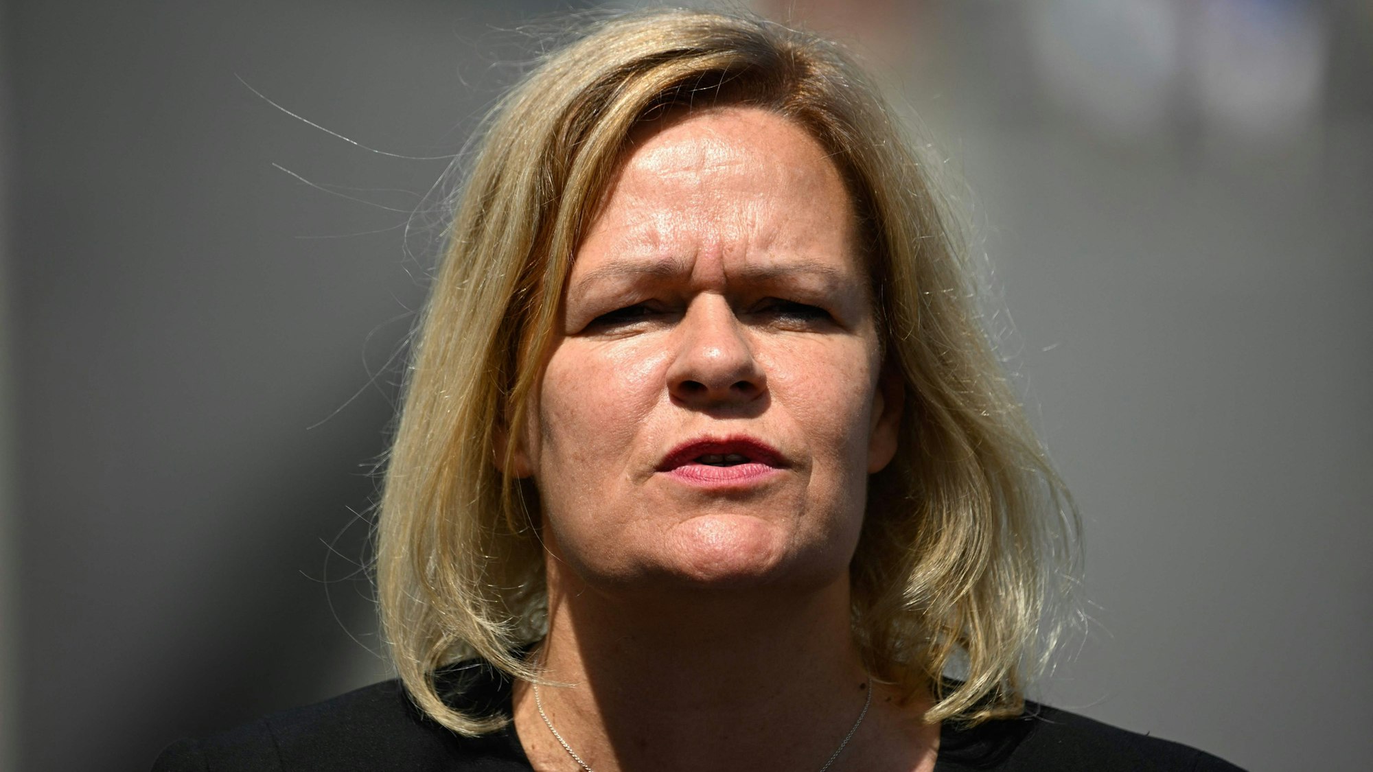 German Interior Minister Nancy Faeser delivers a press statement following the weekly meeting of the German cabinet in front of the Chancellery in Berlin on July 13, 2023. (Photo by Tobias SCHWARZ / AFP)