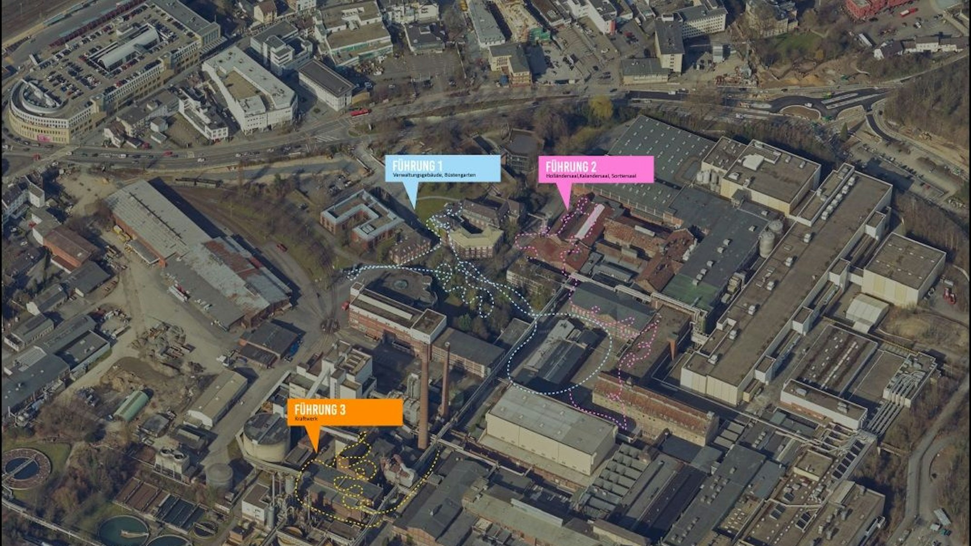 Auf einer Luftaufnahme des Zanders-Geländes in Bergisch Gladbach sind die drei Besichtigungstouren eingezeichnet.
