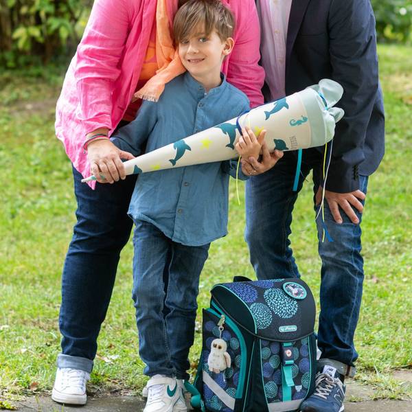 Die Familien Hohmann ist zusammengerückt und lächelt in die Kamera.