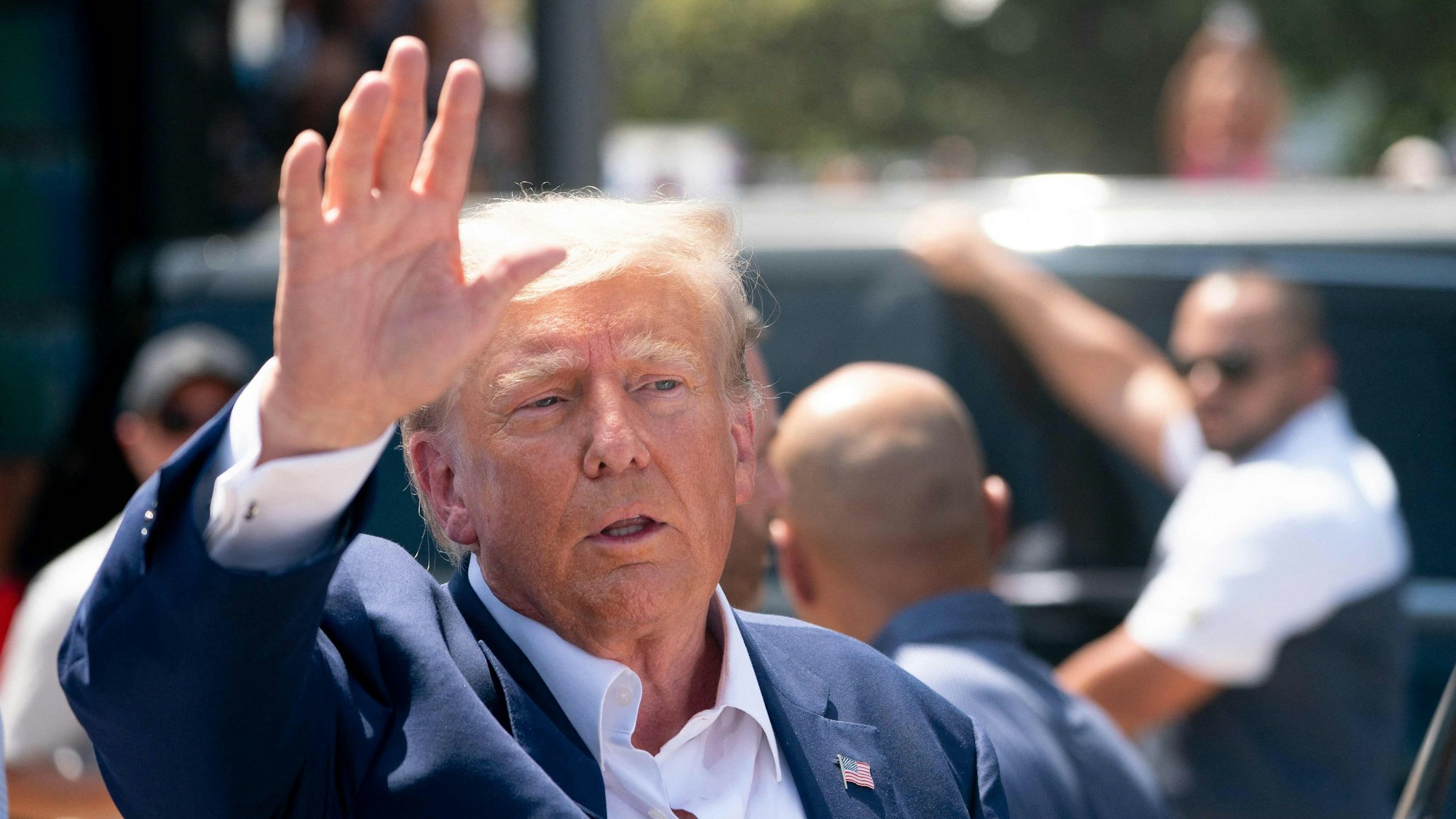 Former US President and 2024 presidential hopeful Donald Trump leaves after speaking at the Iowa State Fair in Des Moines, Iowa, on August 12, 2023. (Photo by Stefani Reynolds / AFP)