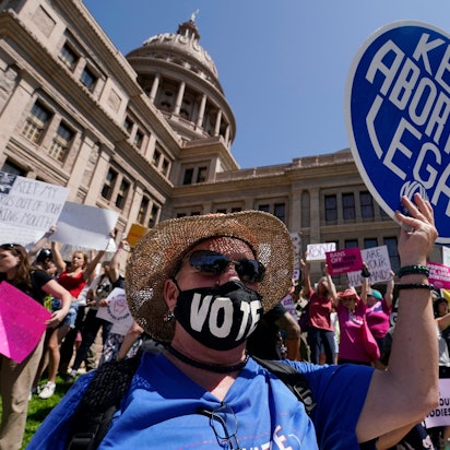 apFILE - Abortion rights demonstrators attend a rally at the Texas state Capitol in Austin, Texas, May 14, 2022.  A Texas judge ruled Friday, Aug. 4, 2023,  the state’s abortion ban has proven too restrictive for women with serious pregnancy complications and must allow exceptions without doctors fearing the threat of criminal charges. The challenge is believed to be the first in the U.S. brought by women who have been denied abortions since the Supreme Court last year overturned Roe v. Wade, which for nearly 50 years had affirmed the constitutional right to an abortion.  (AP Photo/Eric Gay, File)