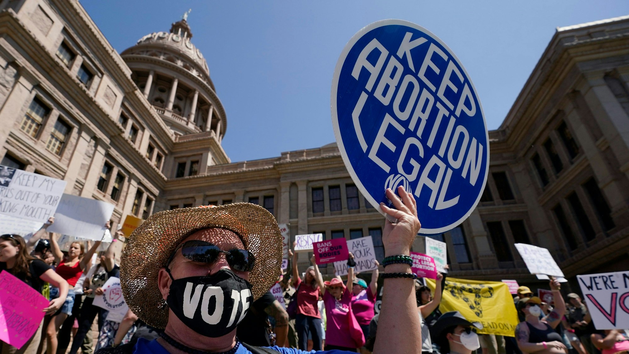 apFILE - Abortion rights demonstrators attend a rally at the Texas state Capitol in Austin, Texas, May 14, 2022. A Texas judge ruled Friday, Aug. 4, 2023, the state’s abortion ban has proven too restrictive for women with serious pregnancy complications and must allow exceptions without doctors fearing the threat of criminal charges. The challenge is believed to be the first in the U.S. brought by women who have been denied abortions since the Supreme Court last year overturned Roe v. Wade, which for nearly 50 years had affirmed the constitutional right to an abortion. (AP Photo/Eric Gay, File)