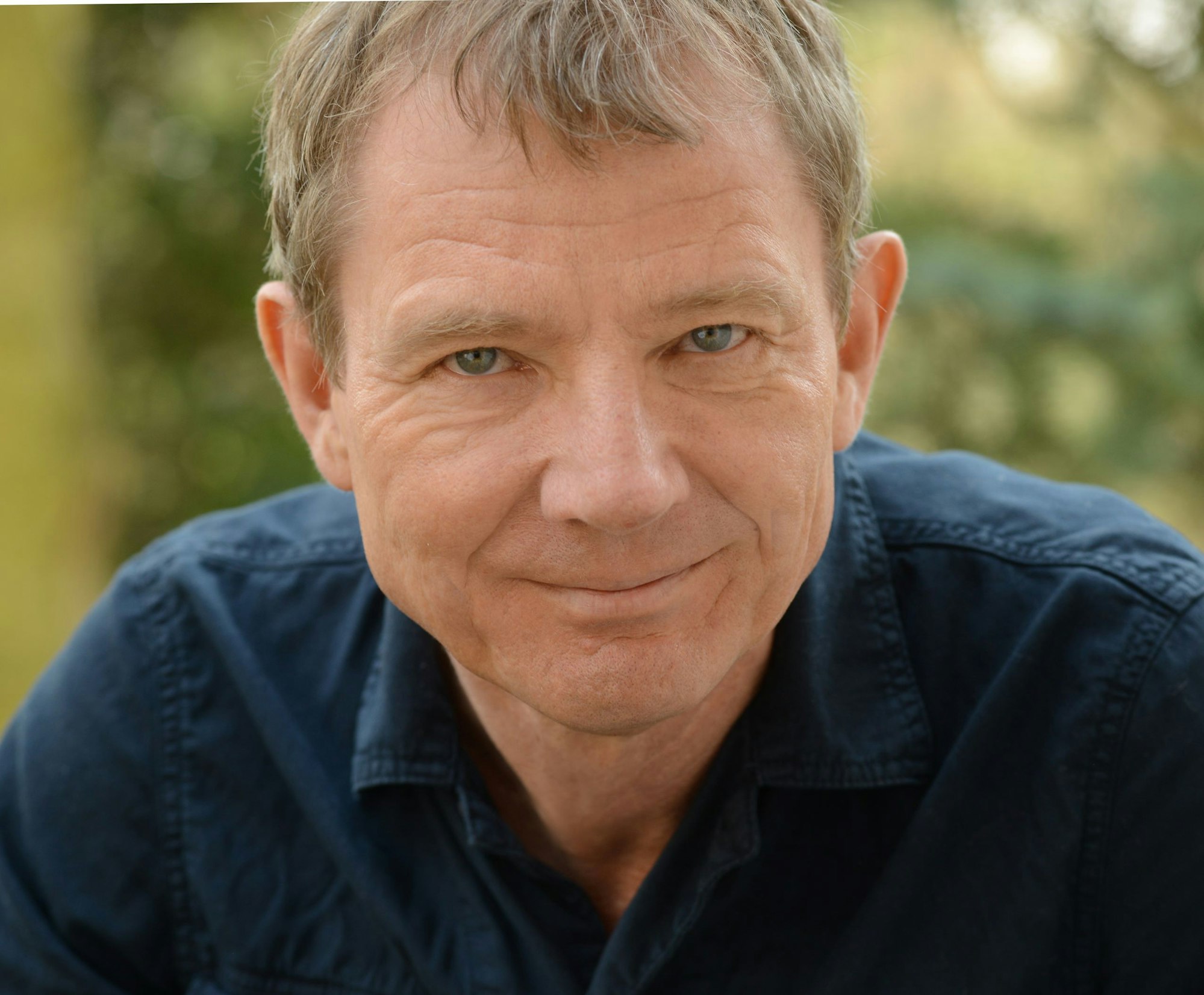 Der Autor Ulrich Woelk.