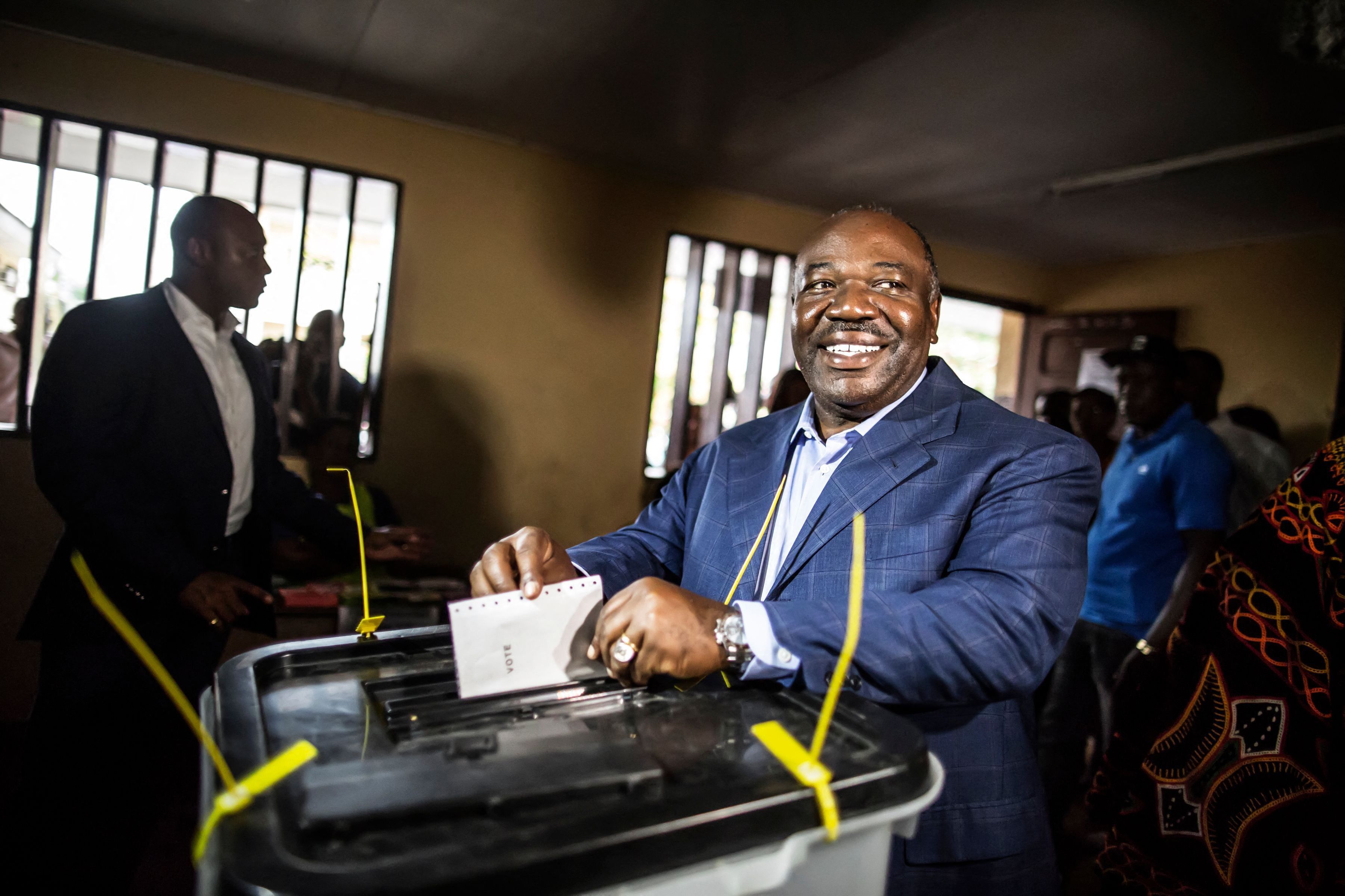 Gabonese President Ali Bongo Ondimba arrives to cast his vote at a polling station during the presidential election on August 27, 2016 in Libreville. A group of Gabonese military officers appeared on television on August 30, 2023 announcing they were "putting an end to the current regime" and scrapping official election results that had handed another term to veteran President Ali Bongo Ondimba.
During the announcement, AFP journalists heard gunfire ring out in the Gabonese capital, Libreville. ´