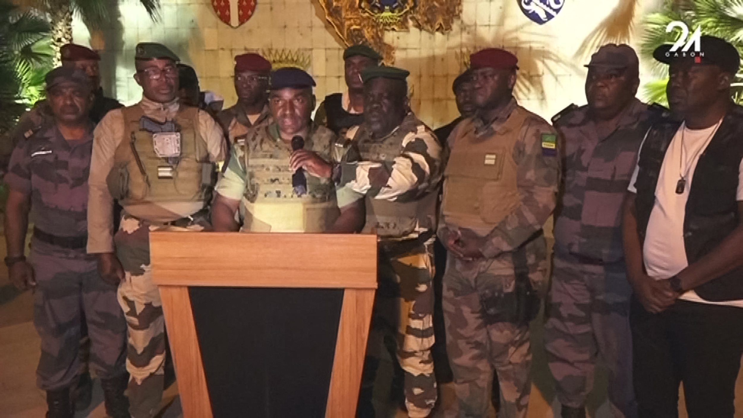 This video grab taken from Gabon 24 shows Gabonese soldiers appearing on television on August 30, 2023 announcing they were "putting an end to the current regime" and the cancellation of an election that, according to official results, President Ali Bongo Ondimba won. During the announcement, AFP journalists heard gunfire ring out in the Gabonese capital, Libreville.
While announcing the cancellation of the results one of the soldiers announced the dissolution of "all the institutions of the republic". 
"We have decided to defend peace by putting an end to the current regime", one of the soldiers said on TV channel Gabon 24, adding that he was speaking on behalf of the "Committee for the Transition and Restoration of Institutions".
"To this end, the general elections of 26 August 2023 and the truncated results are cancelled," he added.
"All the institutions of the republic are dissolved: the government, the Senate, the National Assembly and the Constitutional Court," he added, announcing the closure of the country's borders "until further notice".
Among the soldiers were members of the Republican Guard as well as soldiers of the regular army and police officers.