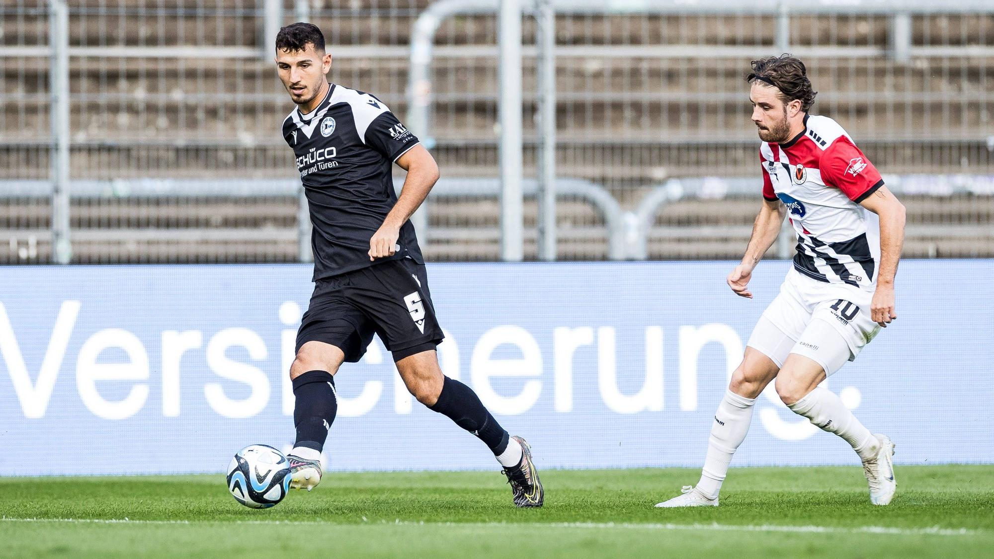 3. Liga: Viktoria Koeln - Arminia Bielefeld 03.09.2023 Semi Belkahia Arminia Bielefeld, 5, David Philipp Viktoria Koeln, 10 3. Liga: Viktoria Koeln - Arminia Bielefeld, Koeln, Sportpark Hoehenberg DFB REGULATIONS PROHIBIT ANY USE OF PHOTOGRAPHS AS IMAGE SEQUENCES AND/OR QUASI-VIDEO. *** 3 Liga Viktoria Koeln Arminia Bielefeld 03 09 2023 Semi Belkahia Arminia Bielefeld, 5 , David Philipp Viktoria Koeln, 10 3 Liga Viktoria Koeln Arminia Bielefeld, Koeln, Sportpark Hoehenberg DFB REGULATIONS PROHIBIT ANY USE OF PHOTOGRAPHS AS IMAGE SEQUENCES AND OR QUASI VIDEO Copyright: xBEAUTIFULxSPORTS/Wunderlx