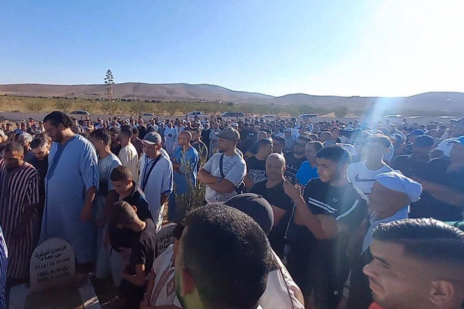 Mourners attend the funeral of Bilal Kissi, shot dead by the Algerian coastguard when he and a fellow jet skier strayed across the maritime border between Algeria and Morocco, in the city of Saidia in northeastern Morocco on August 31, 2023. Kissi and Abdelali Merchouer, both French-Moroccan dual nationals, came under fire after taking a wrong turn off the beach resort of Saidia on Morocco's northeast tip, the Le360 news website said, citing a witness. (Photo by AFP)