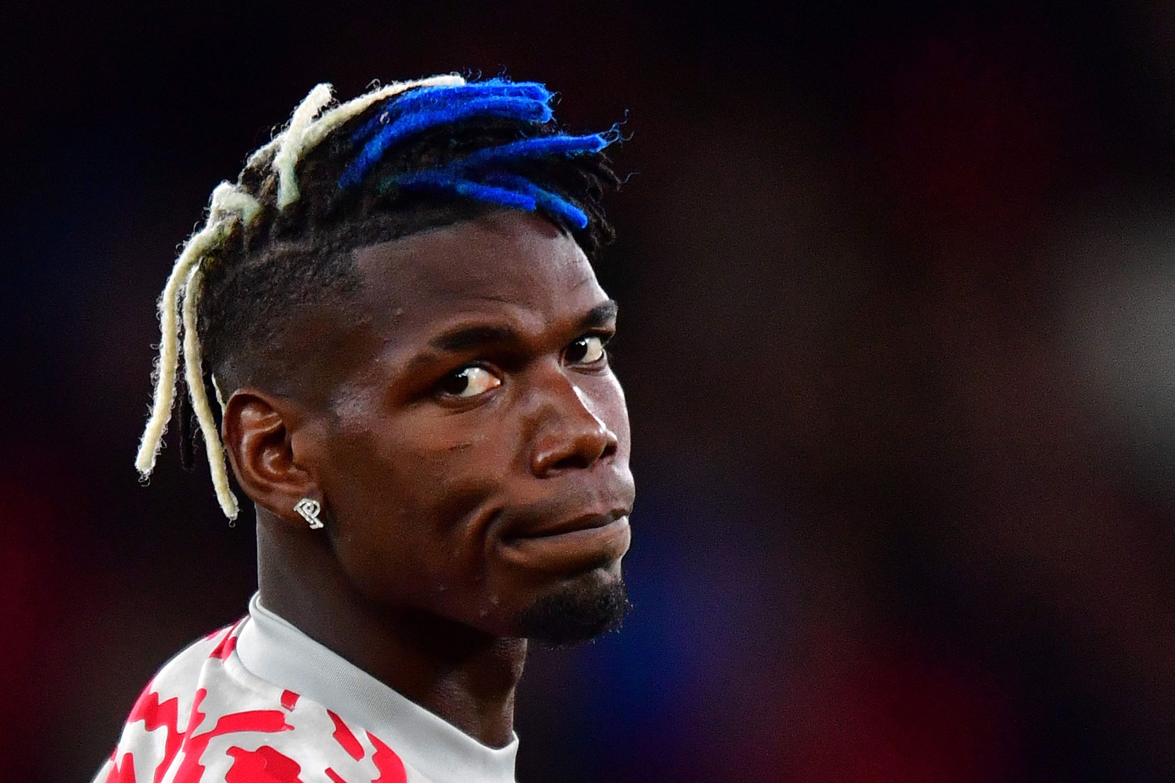 (FILES) A picture taken on September 29, 2021 shows Manchester United's French midfielder Paul Pogba at Old Trafford stadium in Manchester. Juventus and France midfielder Paul Pogba has been provisionally suspended after a doping control detected the banned substance testosterone, Italian anti-doping authorities (NADO) told AFP on September 11, 2023. (Photo by Anthony Devlin / AFP)