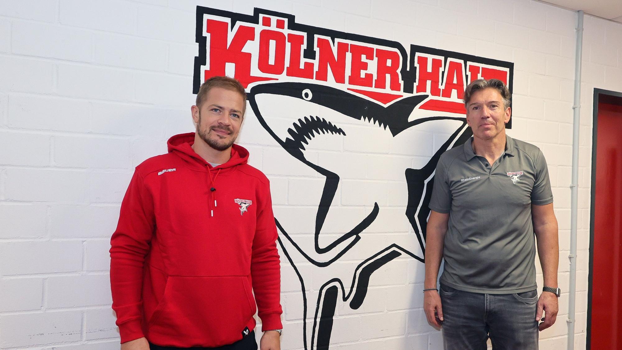 Haie-Kapitän Moritz Müller (l.) und Coach Uwe Krupp.