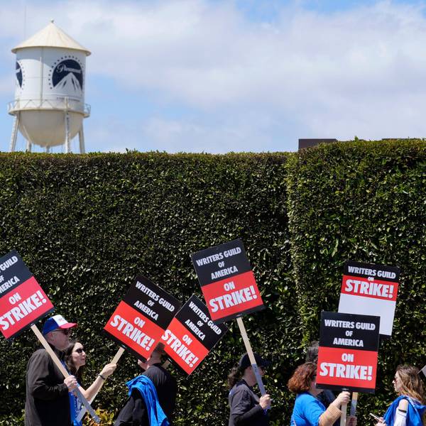 FILE - Striking writers take part in a rally in front of Paramount Pictures studio, Tuesday, May 2, 2023, in Los Angeles. A tentative deal was reached, Sunday, Sept. 24, 2023, to end Hollywood’s writers strike after nearly five months. (AP Photo/Chris Pizzello, File)