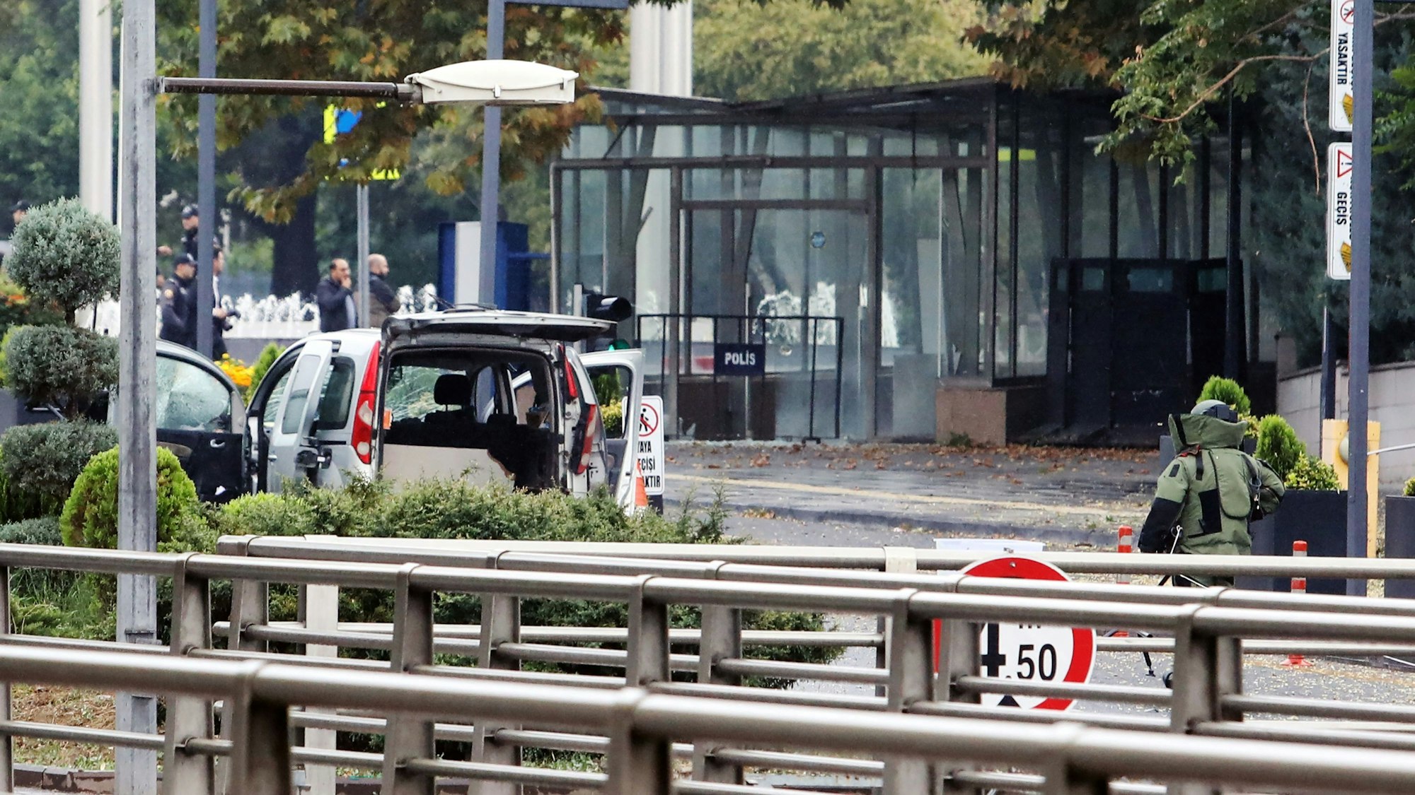 This photograph shows the commercial vehicle used by the two attackers near the Interior Ministry in Ankara, on October 1, 2023, following a bomb attack leaving two police officers injured. The interior ministry said on October 1, 2023, that two attackers arrived in a commercial vehicle around 9:30 am (0630 GMT) "in front of the entrance gate of the General Directorate of Security of our Ministry of the Interior, and carried out a bomb attack." (Photo by Adem ALTAN / AFP)