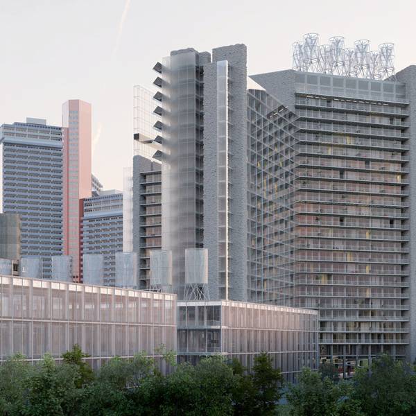 Ein Hochhaus und ein flaches Gebäude ist zu sehen.