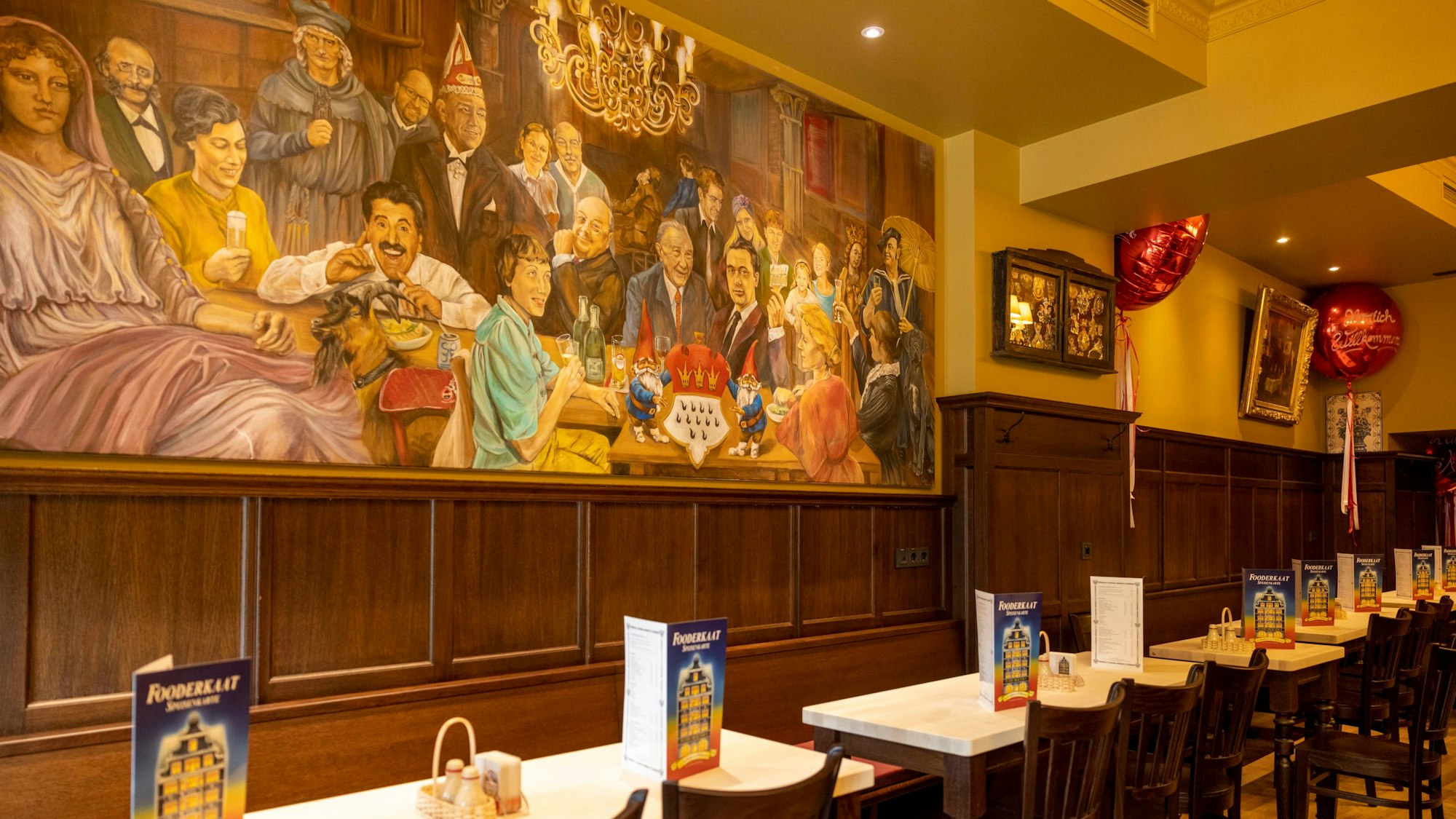 Auf einem großen Gemälde vereinen sich Größen der Kölner Stadtgeschichte und Mitglieder der Familie Peters.