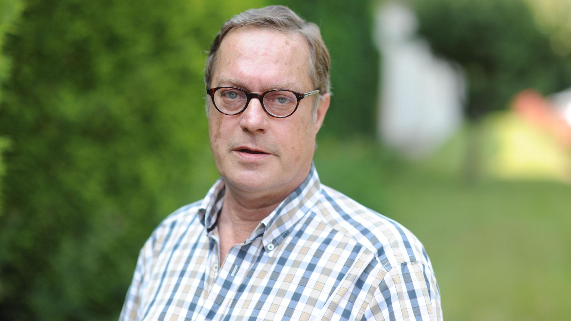 Ein Porträtbild des Journalisten.