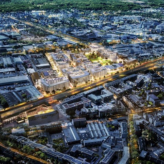 Die Visualisierung zeigt das künftige Stadtquartier „Pan“ zwischen den Bahngleisen und der Widdersdorfer Straße in Ehrenfeld.