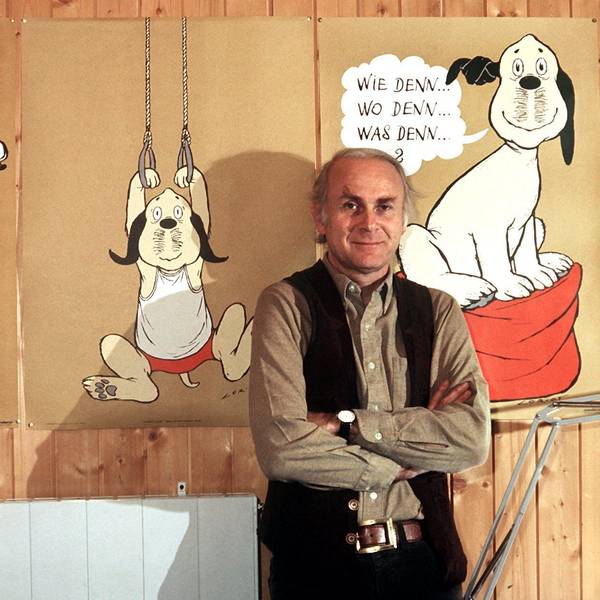 Vicco von Bülow steht in seinem Haus vor Plakaten mit dem Zeichentrickhund "Wum". Vicco von Bülow alias Loriot prägte Generationen und bereicherte die deutsche Sprache. Sein zehnter Todestag jährt sich am 22. August.