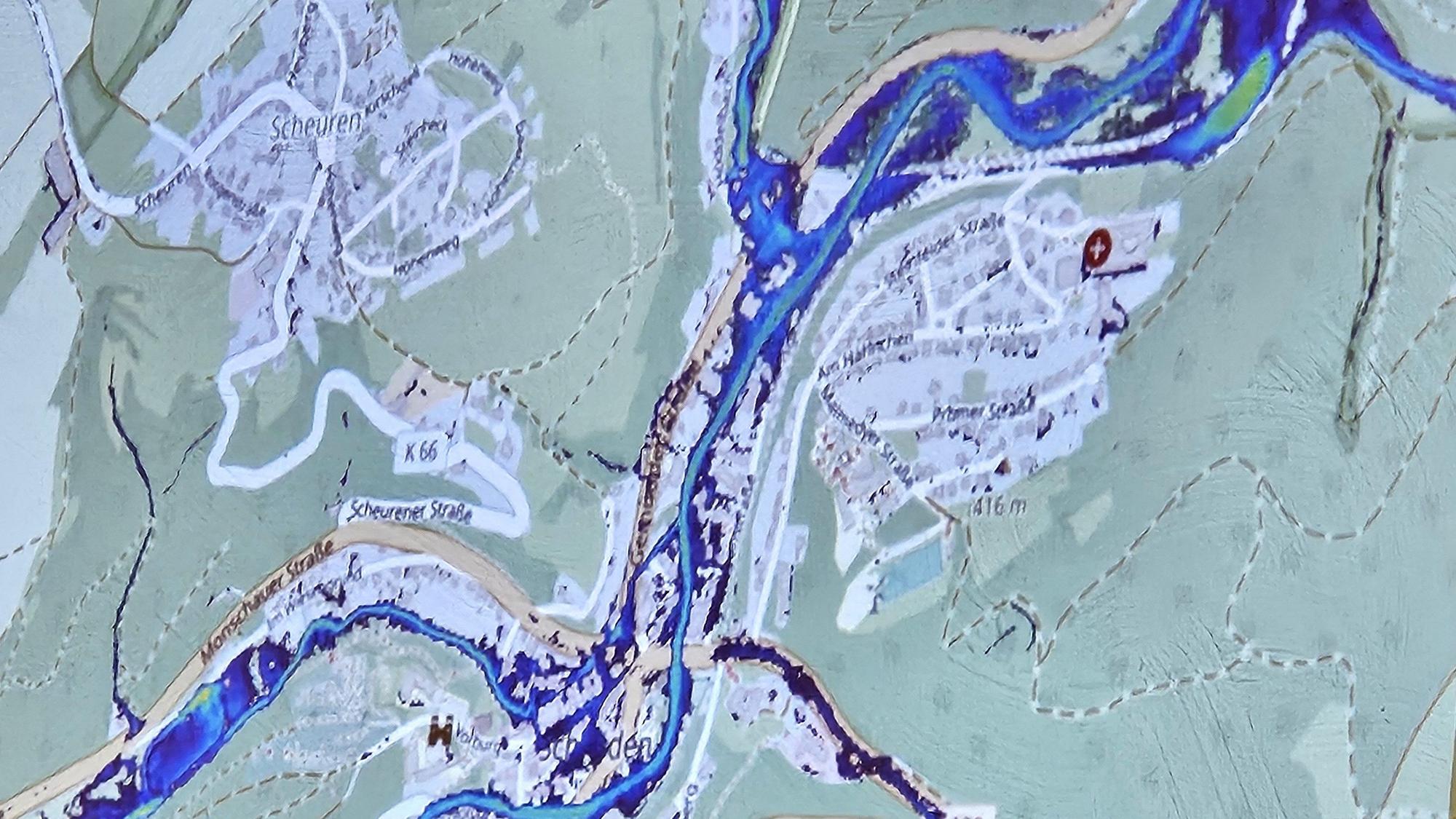 Das Foto zeigt eine digitale Karte von Schleiden mit blauen Überflutungsflächen.