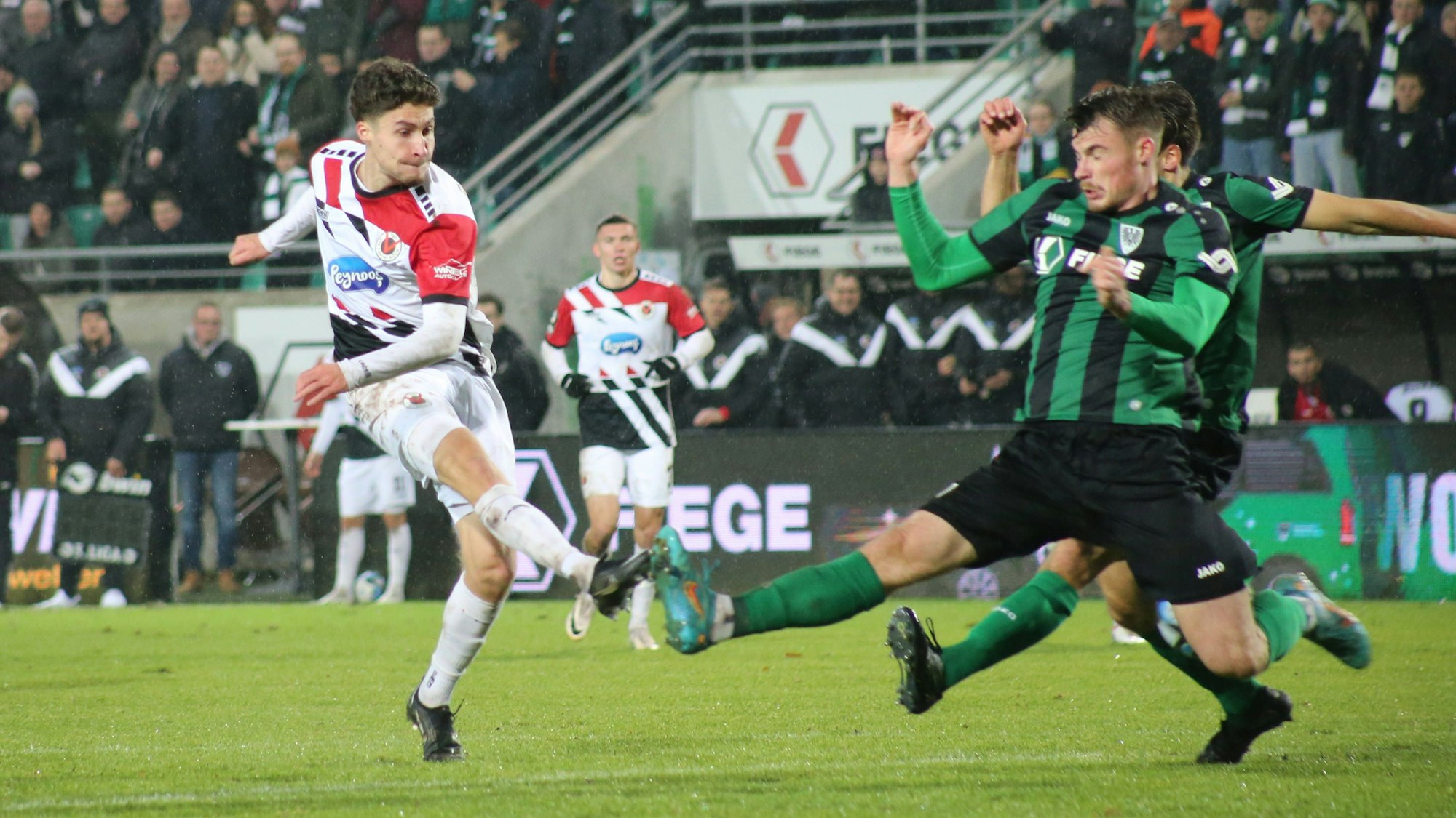 26.11.2023, xgrfx, Fussball 3.Liga, Preußen Münster - Viktoria Köln emspor, v.l. Donny Bogicevic Viktoria Köln, Niko Koulis Preußen Münster DFL/DFB REGULATIONS PROHIBIT ANY USE OF PHOTOGRAPHS as IMAGE SEQUENCES and/or QUASI-VIDEO Münster *** 26 11 2023, xgrfx, Fussball 3 Liga, Preußen Münster Viktoria Köln emspor, v l Donny Bogicevic Viktoria Köln , Niko Koulis Preußen Münster DFL DFB REGULATIONS PROHIBIT ANY USE OF PHOTOGRAPHS as IMAGE SEQUENCES and or QUASI VIDEO Münster