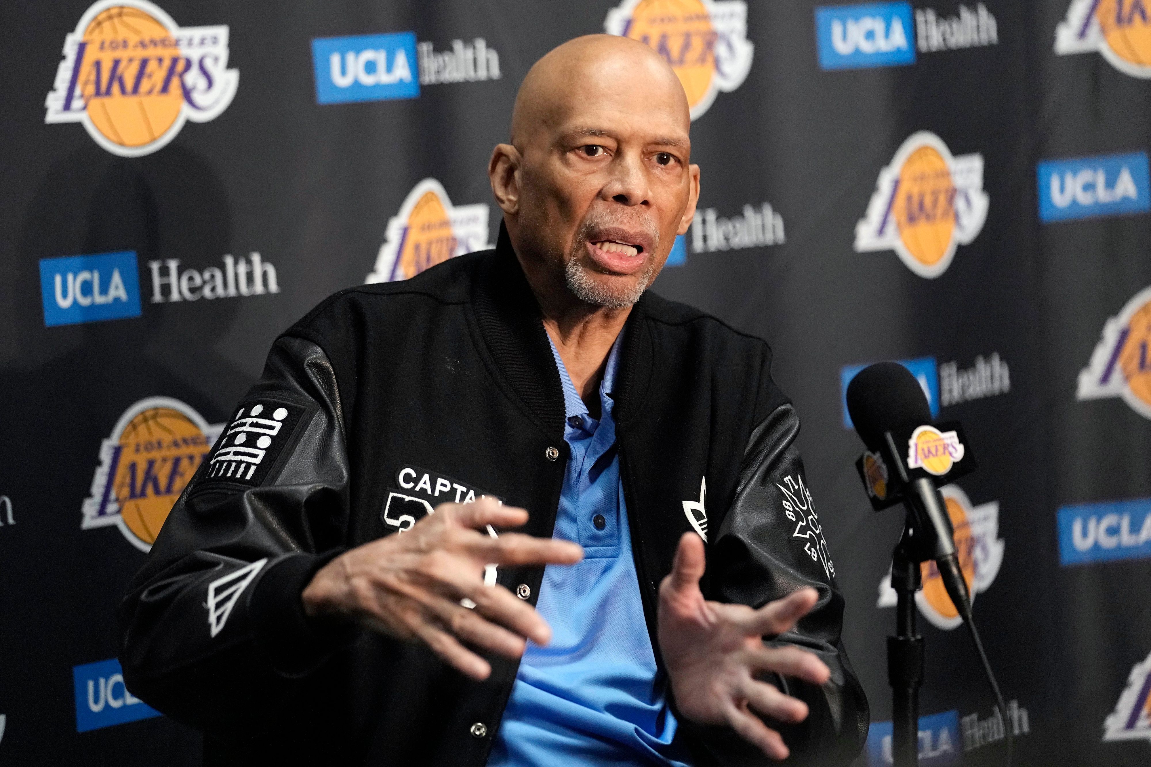 Kareem Abdul-Jabbar speaks during a news conference prior to an NBA basketball game between the Los Angeles Lakers and the Milwaukee Bucks Thursday, Feb. 9, 2023, in Los Angeles. Kareem Abdul-Jabbar fell at a concert in Los Angeles and broke his hip. The NBA Hall of Famer was attending a show Friday night Dec. 15, 2023 when he was injured. Paramedics at the undisclosed venue responded and the 76-year-old was transported to a hospital for treatment. (AP Photo/Mark J. Terrill)