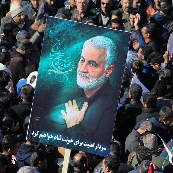 (FILES) Iranian mourners gather during the final stage of funeral processions for slain top general Qasem Soleimani, in his hometown Kerman on January 7, 2020. At least 20 people were killed in Iran on January 3, 2024 as two blasts struck a crowd marking the anniversary of the 2020 killing of general Qasem Soleimani, state television reported. Soleimani was killed outside Baghdad airport on January 3, 2020 in a drone strike ordered by then-US President Donald Trump. (Photo by ATTA KENARE / AFP)