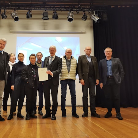 Das Bild zeigt eine Gruppe Menschen.