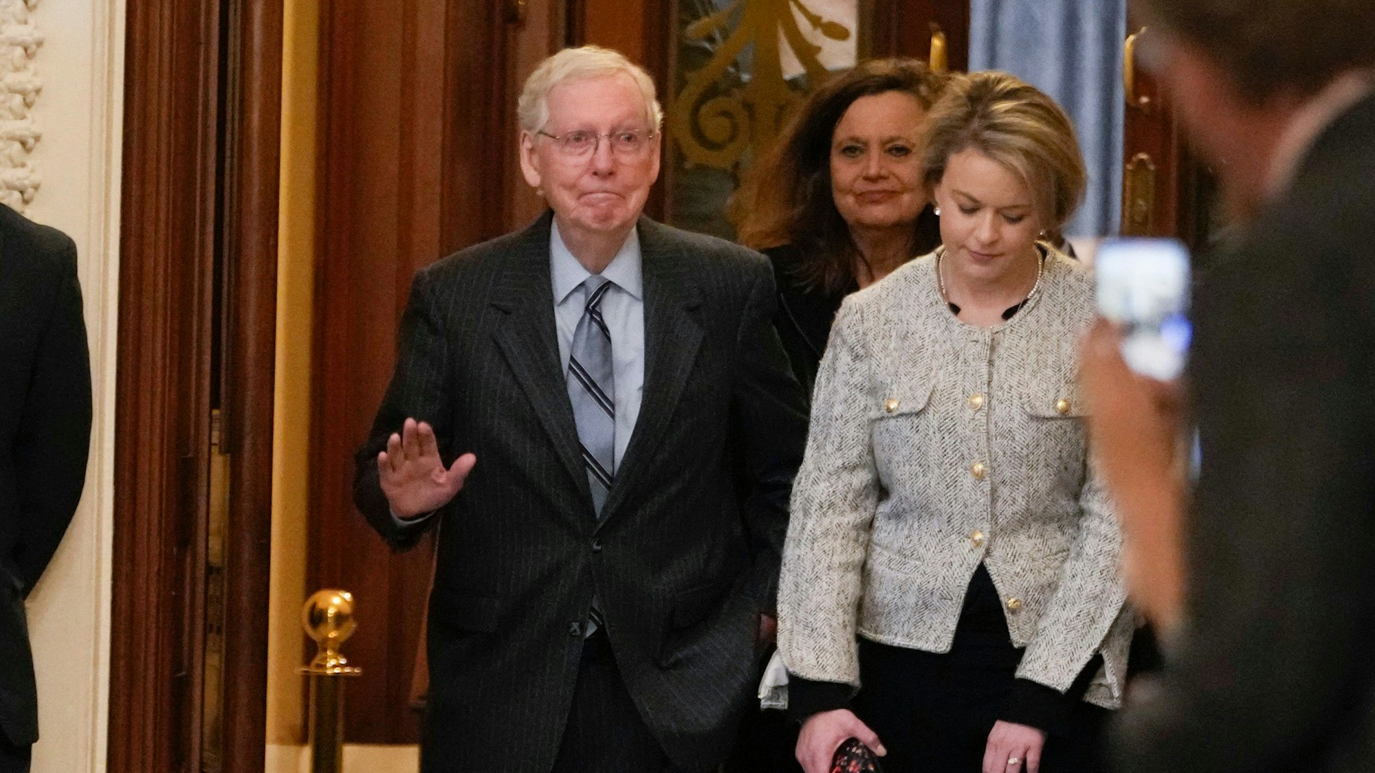 Senate Minority Leader Mitch McConnell of Ky., walks off the Senate floor after speaking, Wednesday, Feb. 28, 2024 at the Capitol in Washington. McConnell says he'll step down as Senate Republican leader in November. The 82-year-old Kentucky lawmaker is the longest-serving Senate leader in history. He's maintained his power in the face of dramatic changes in the Republican Party. He's set to make the announcement Wednesday McConnell on the Senate floor. (AP Photo/Jacquelyn Martin)