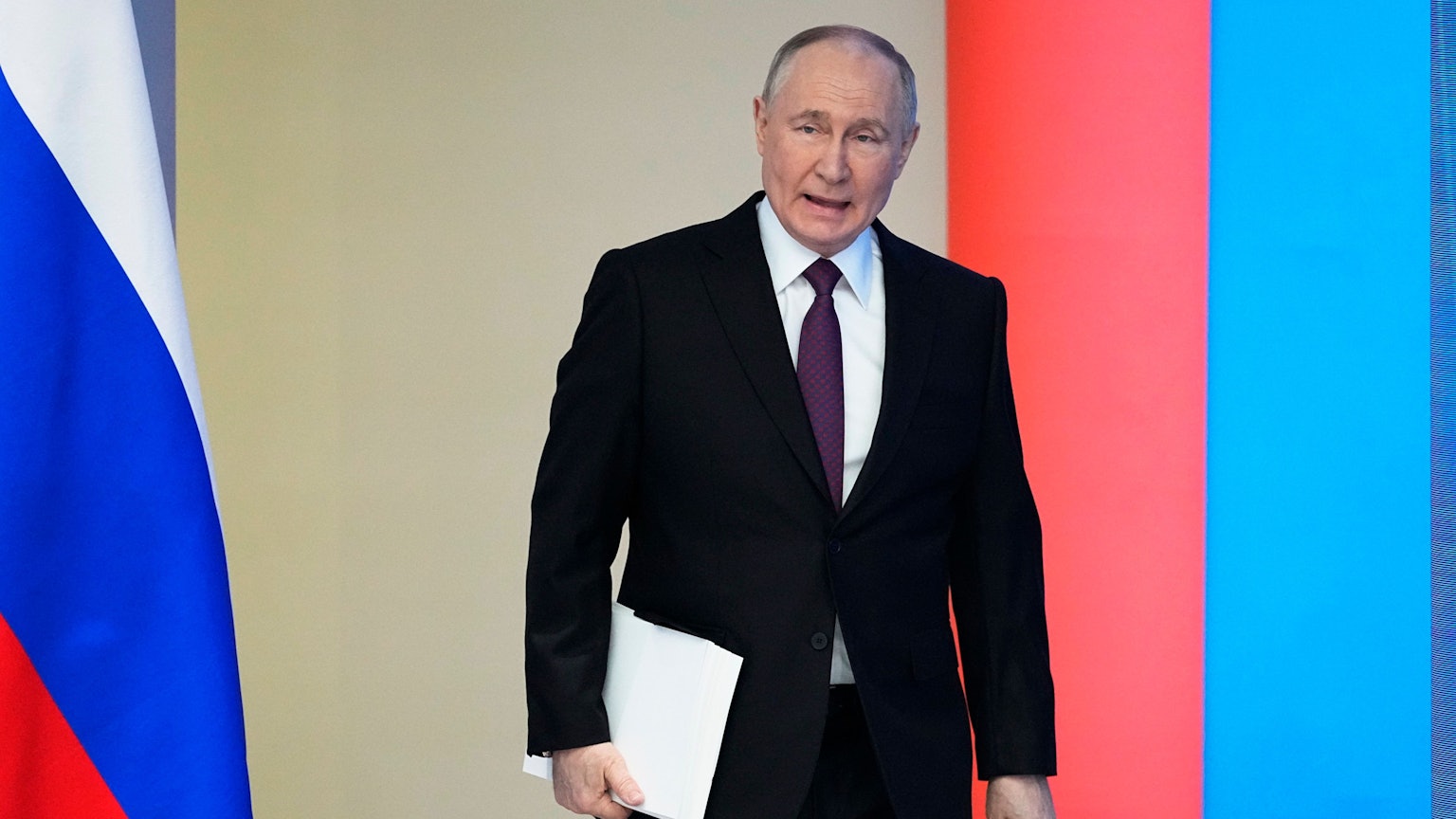 Russian President Vladimir Putin enters a hall to deliver his state-of-the-nation address in Moscow, Russia, Thursday, Feb. 29, 2024. (AP Photo/Alexander Zemlianichenko)