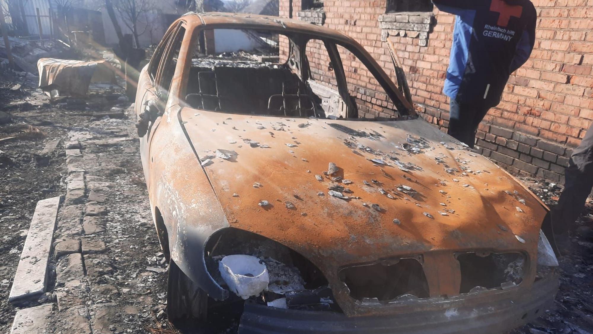 11. Hilfstour Rheinbach hilft in die Ukraine. Ein Autowrack und ein Helfer von Rheinbach hilft in Charkiw